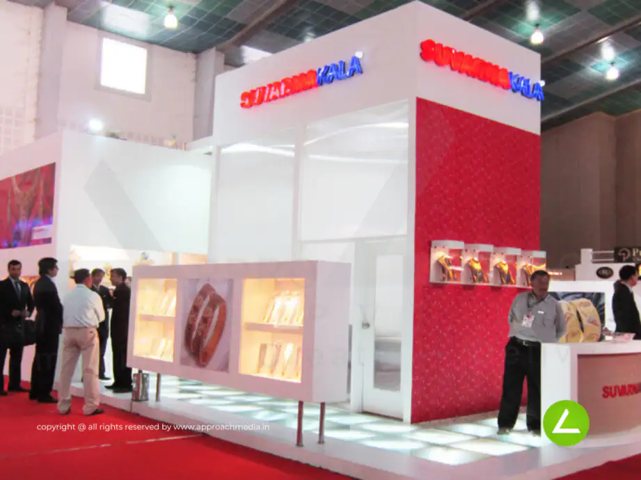 Gold Jewellery Exhibition Stall Design at GGJS 2012 Ahmedabad — 60 sqm 3 side open trade show booth for Suvarnakala at GGJS 2012, 2012