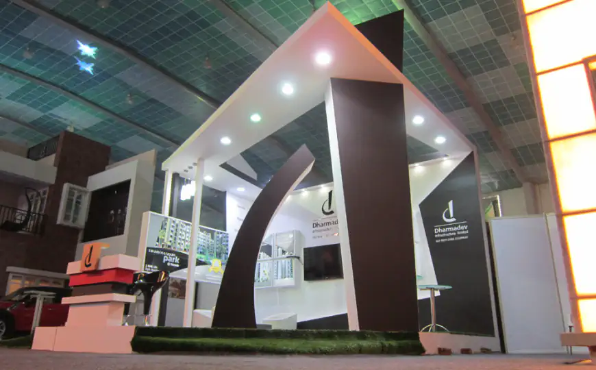 Real Estate Pavilion Stall Design at GIHED 2016 Ahmedabad Dharmadev — 36 sqm 3 side open trade show booth for Dharmadev at GIHED 2016, 2016