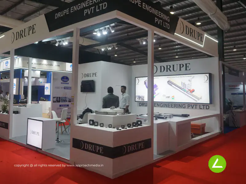 Process Automation Exhibition Stall Design at ENGIMACH 2023 Gandhinagar — 36 sqm 2 side open trade show booth for Drupe at ENGIMACH 2023, 2023