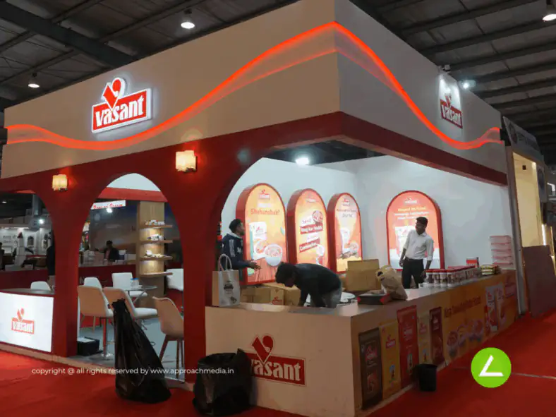Food & Spices Exhibition Stall Design at Khadya Khorak Expo Gandhinagar — 36 sqm 2 side open trade show booth for Vasant at KDKH 2023 (Khadya Khorak Expo), 2023