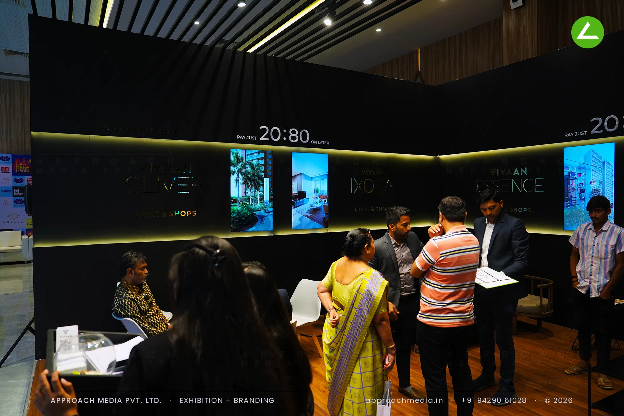 Vivaan Realty at Divya Bhaskar Property Show Ahmedabad | 36 sqm Black Exhibition Stall Design — photo 4