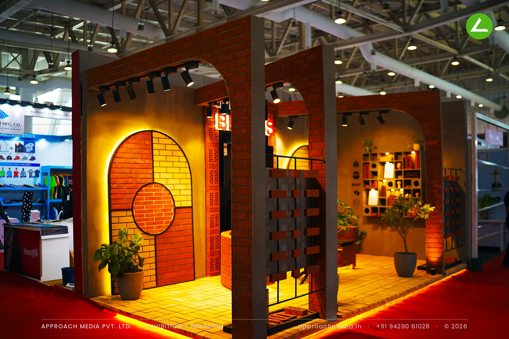 Urban Bricks exhibition stall design at BNI Symposium Gandhinagar built from clay brick arches with warm backlit niches