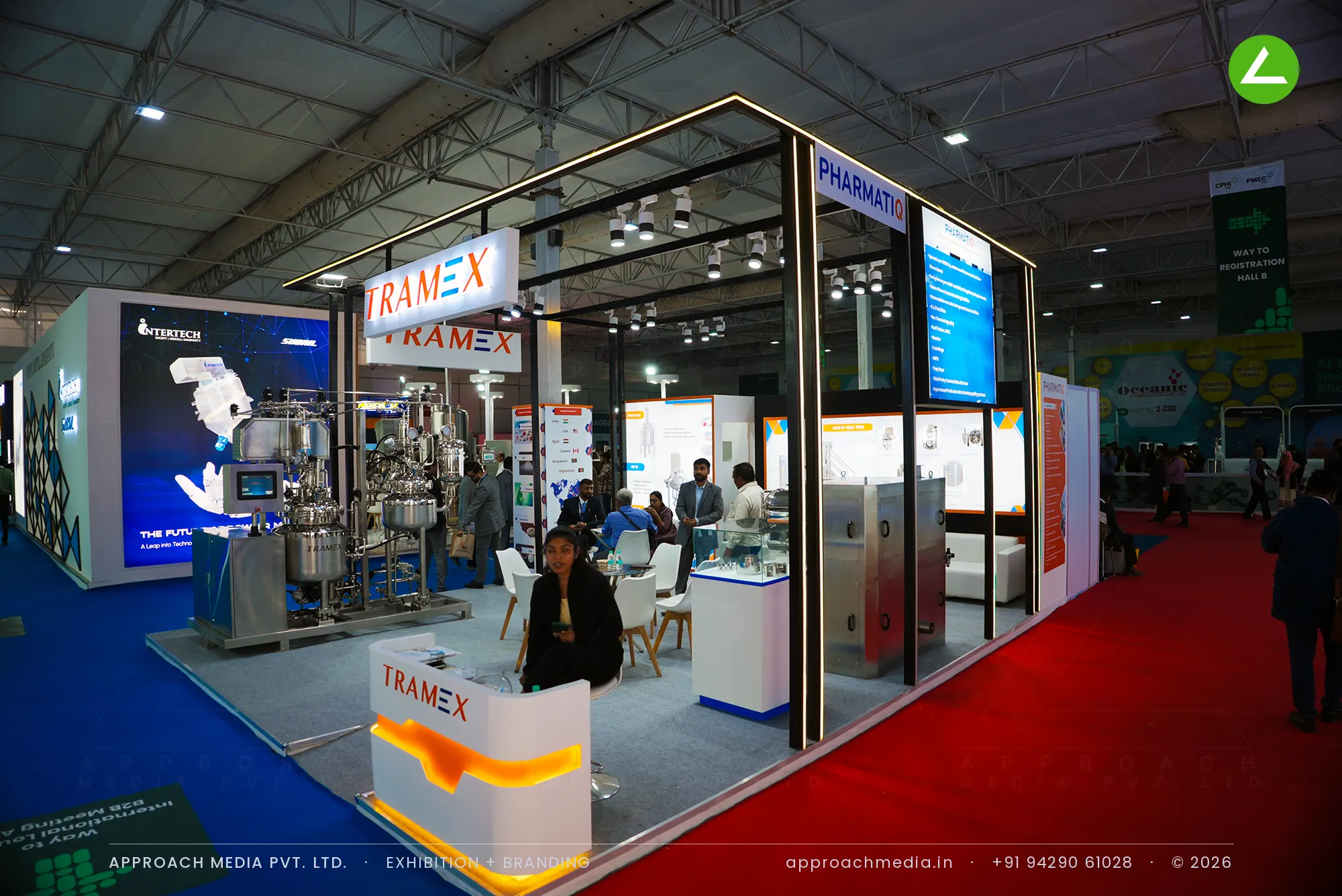 Tramex exhibition stall design at CPHI Greater Noida with black lit frame and stainless pharma process machinery