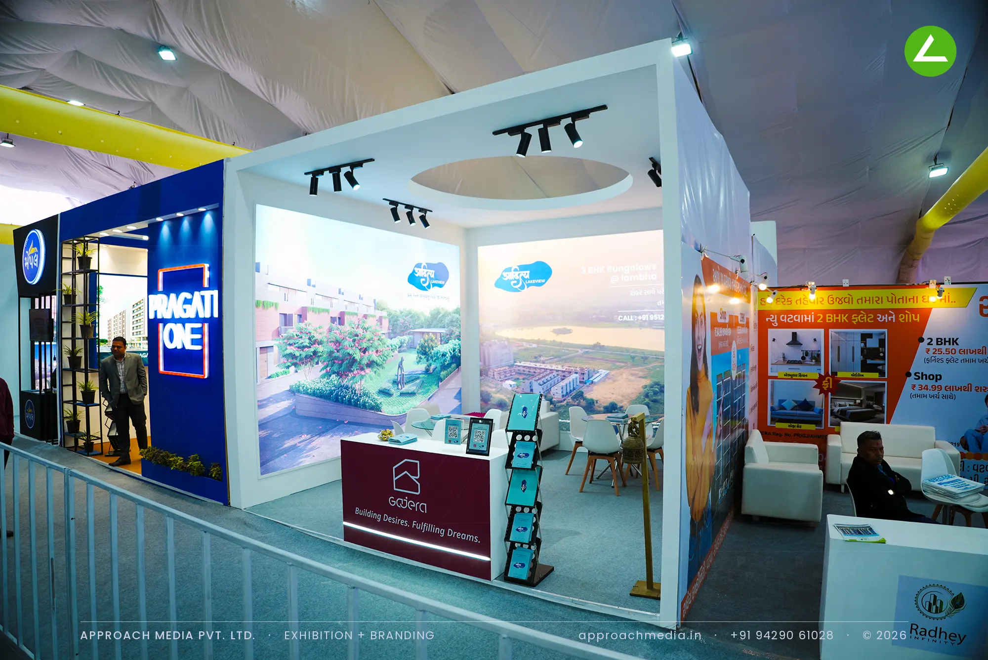 Gajera exhibition stall design at Divya Bhaskar Property Show Narol Ahmedabad, white portal frame with lakefront mural
