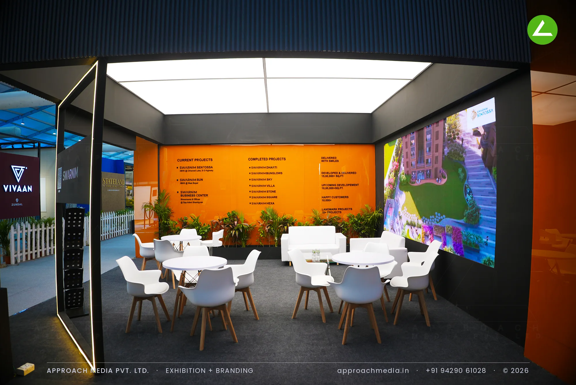 Swarnim: Orange-and-Charcoal Exhibition Stall Design at NAREDCO Property Expo Ahmedabad — photo 4