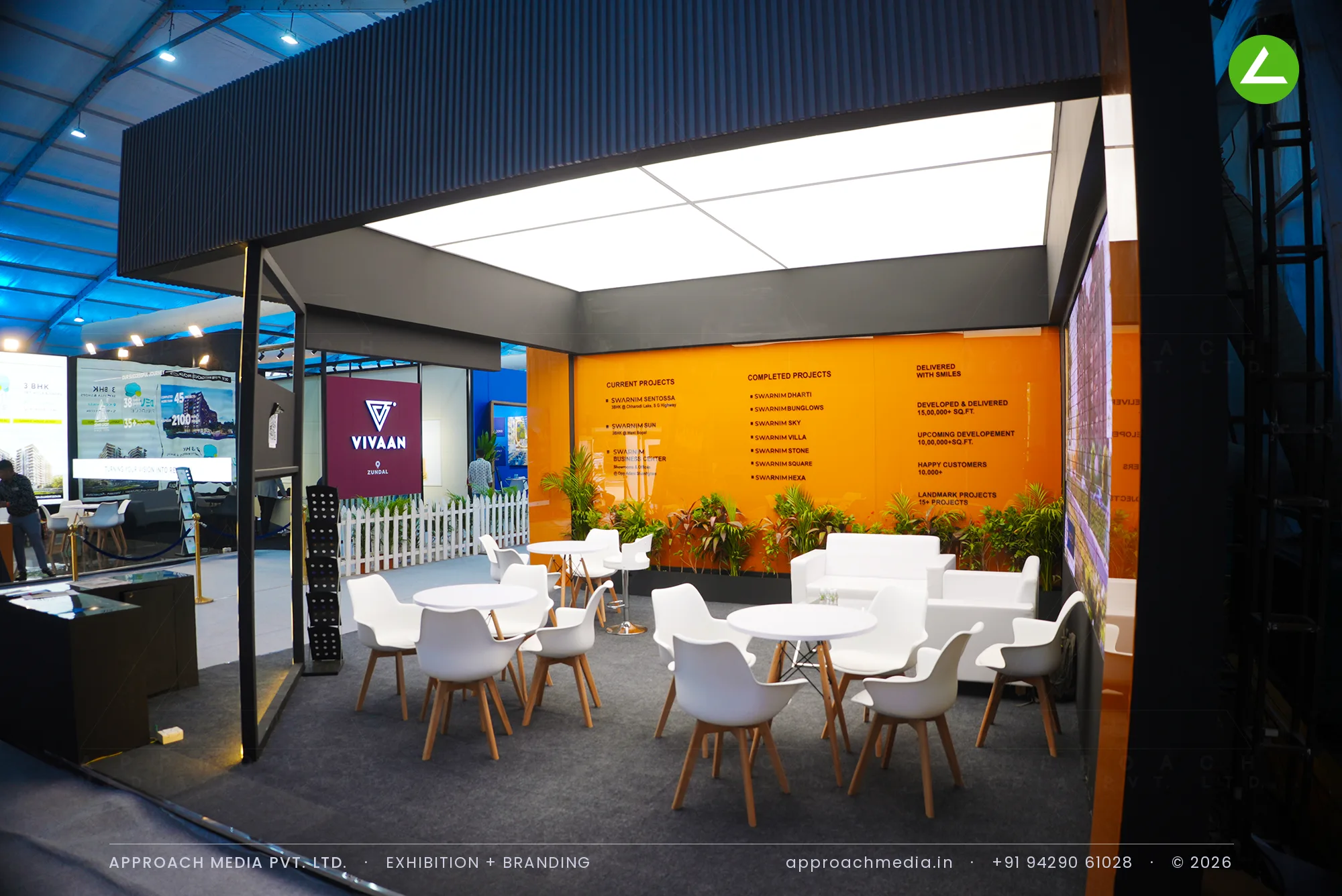 Swarnim: Orange-and-Charcoal Exhibition Stall Design at NAREDCO Property Expo Ahmedabad — photo 3