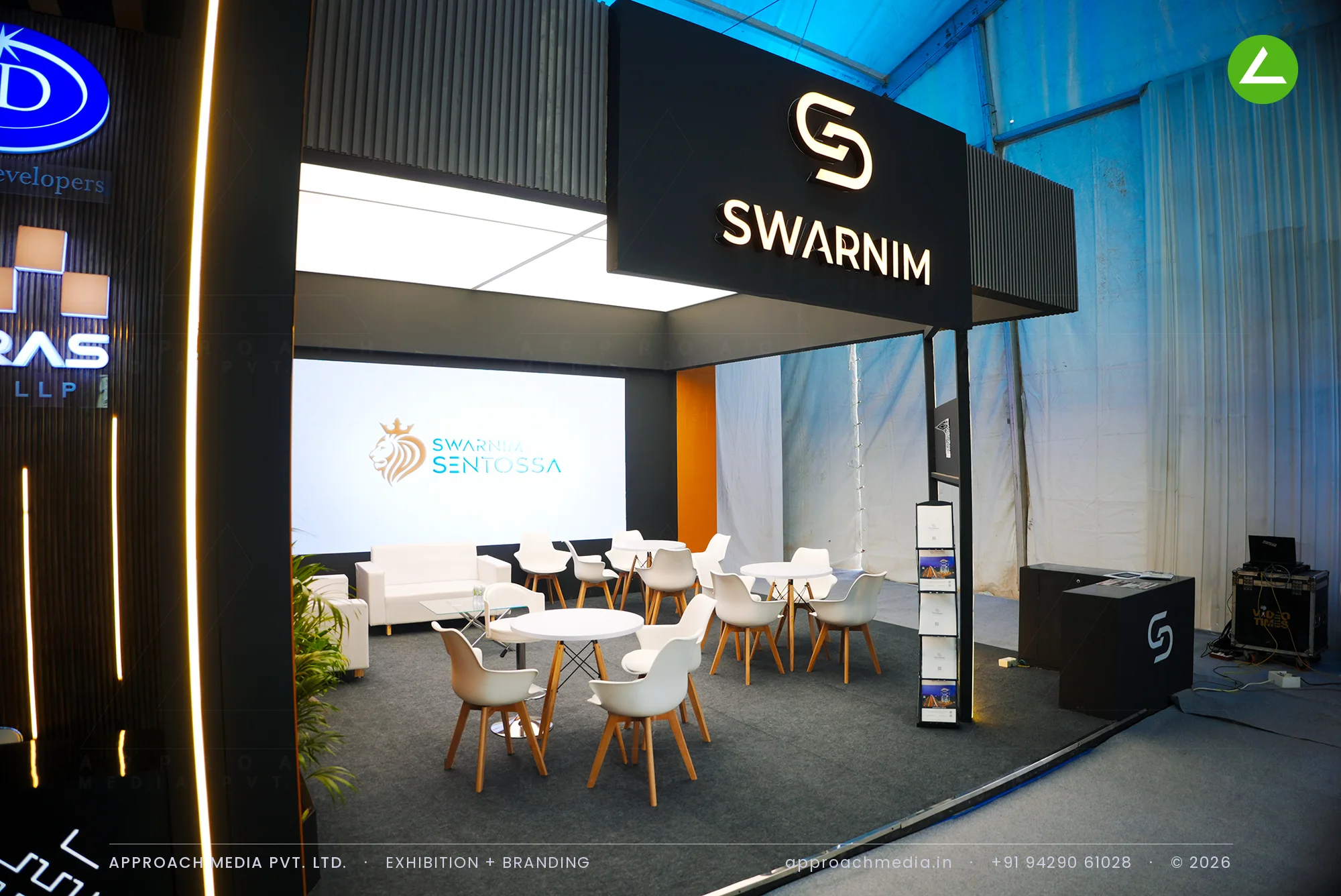 Swarnim: Orange-and-Charcoal Exhibition Stall Design at NAREDCO Property Expo Ahmedabad — photo 2