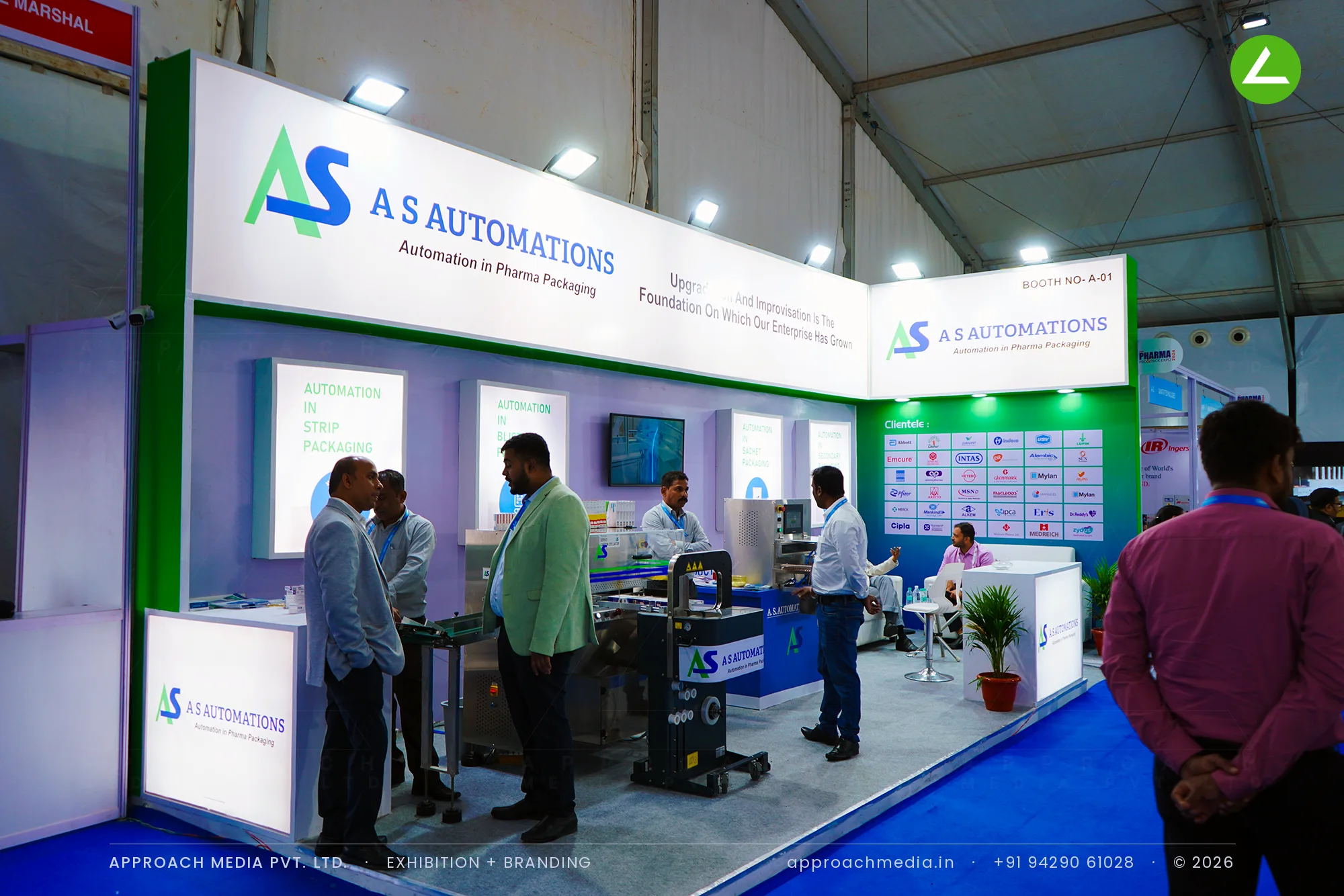 A S Automations exhibition stall design at Pharma Pro Pack Hyderabad with live packaging machines on a blue platform