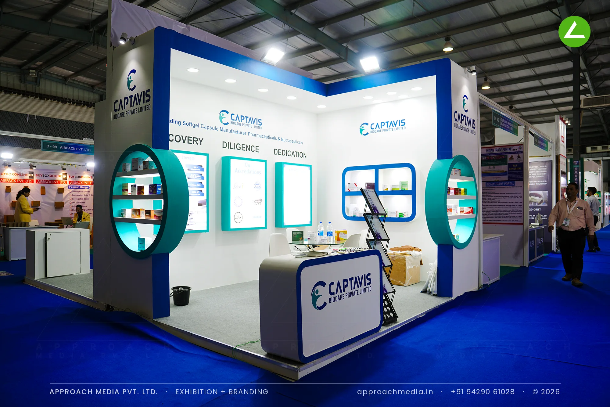 Captavis Biocare exhibition stall design at Pharmatech Expo Gandhinagar with teal circular display niches