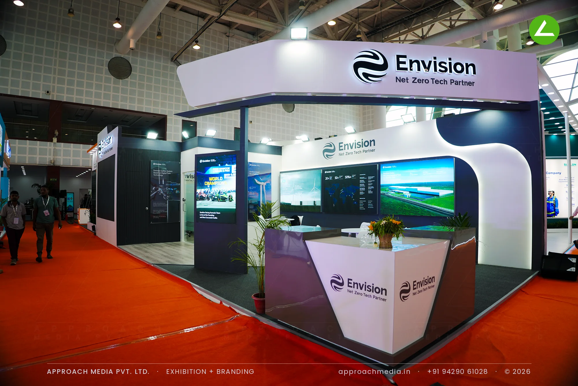 Curved white canopy and LED video wall at the Envision exhibition stall design at Solar Exhibition