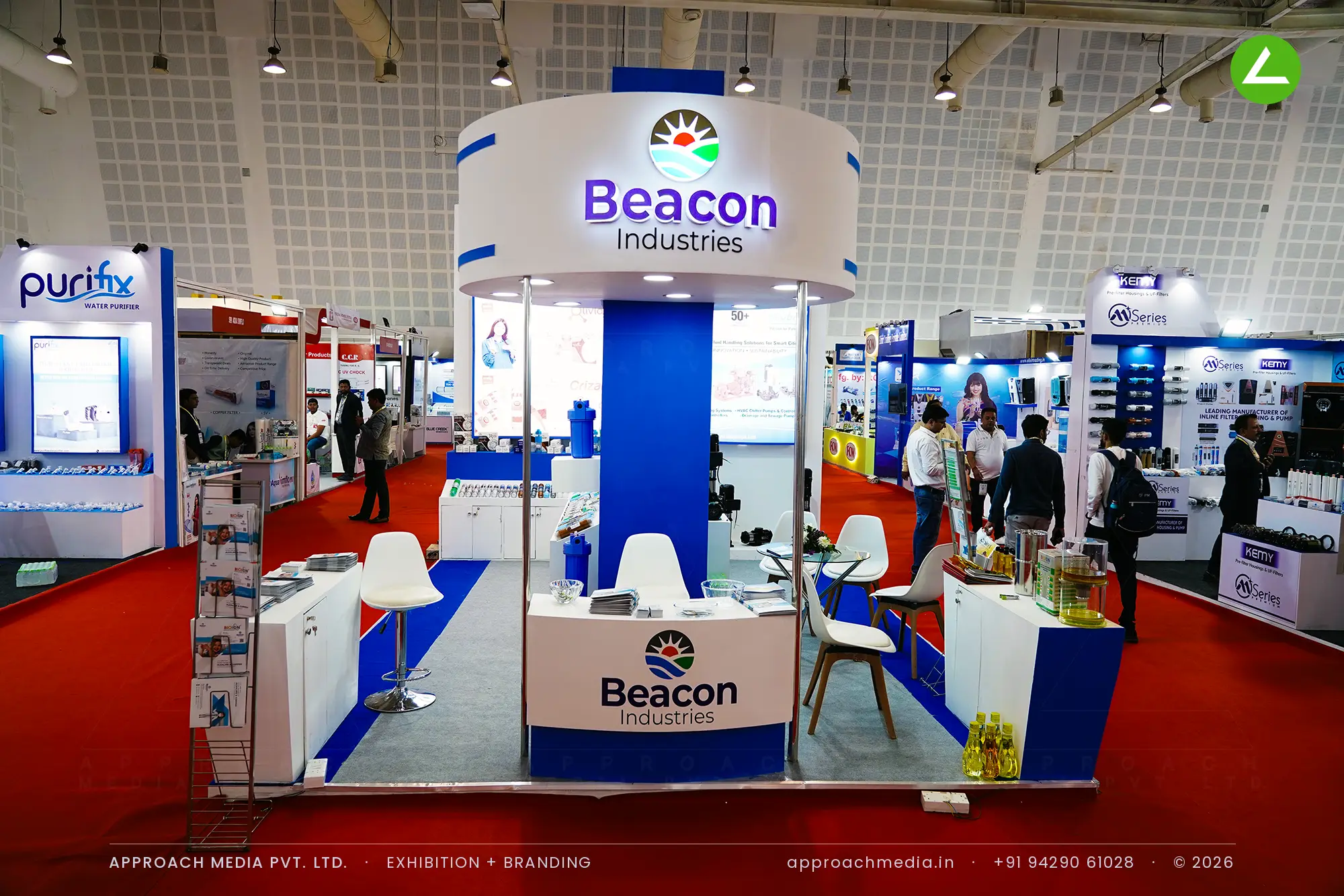 Beacon Industries exhibition stall design at WAPTAG Water Expo Gandhinagar with a suspended circular logo fascia