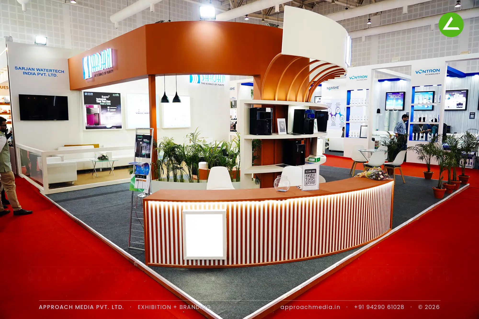 Sarjan Watertech's curved terracotta rib canopy arching over tiered white shelves of water purifiers
