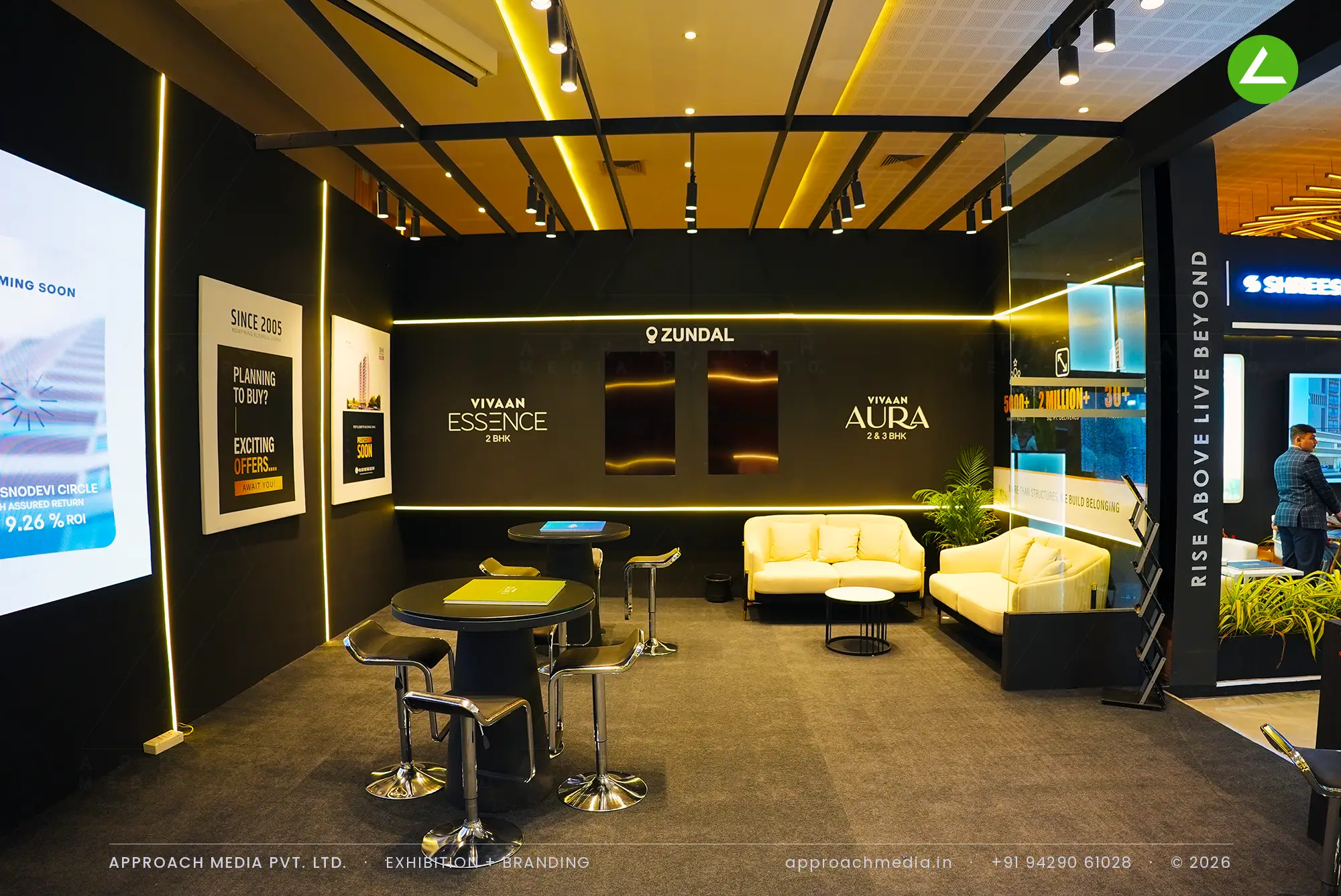 Vivaan, 72 sqm in black and gold: exhibition stall design at Ahmedabad Mirror Property Expo Ahmedabad — photo 2