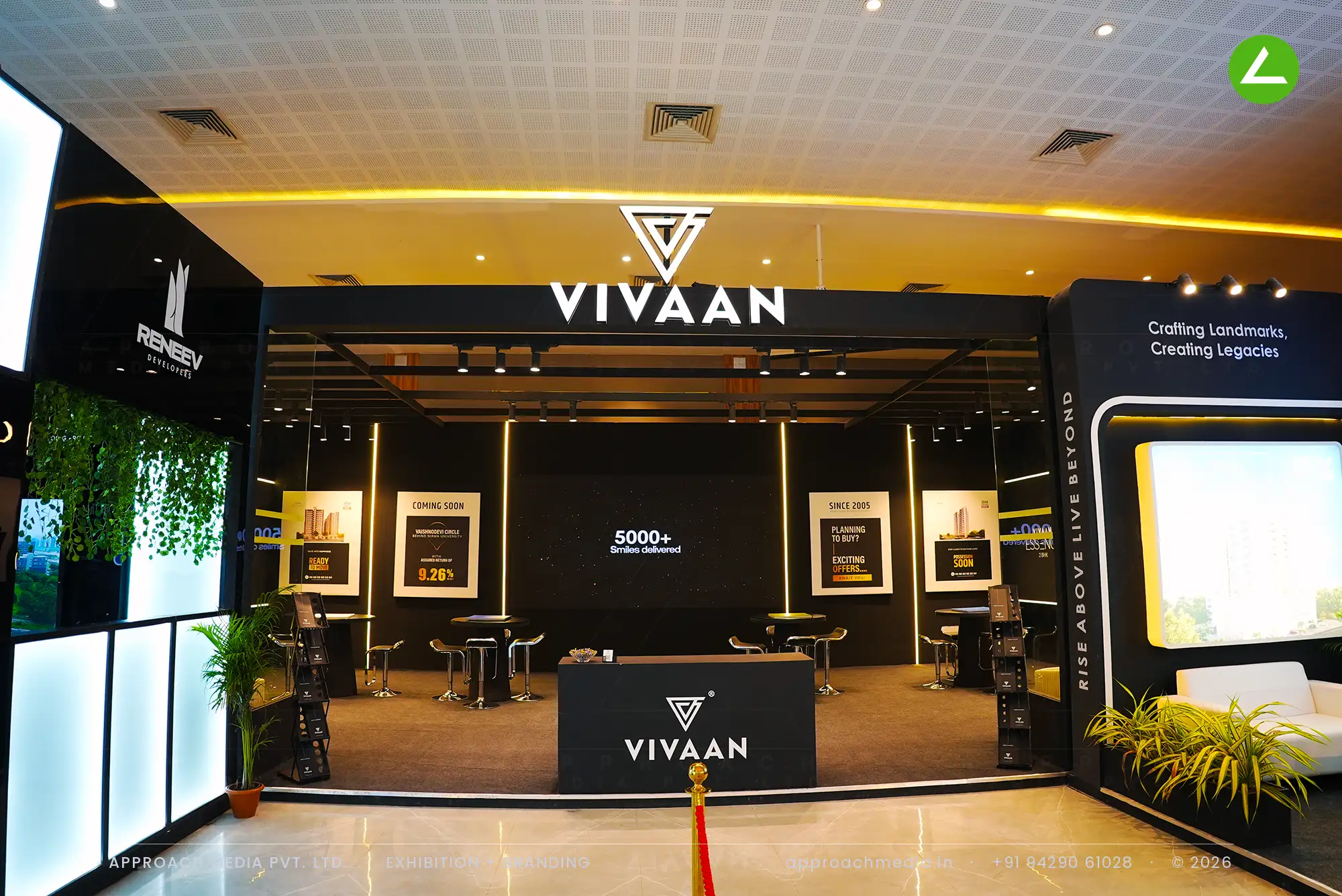 Vivaan's black-panelled lounge traced with warm gold LED lines, with ivory sofas and olive-topped cocktail tables