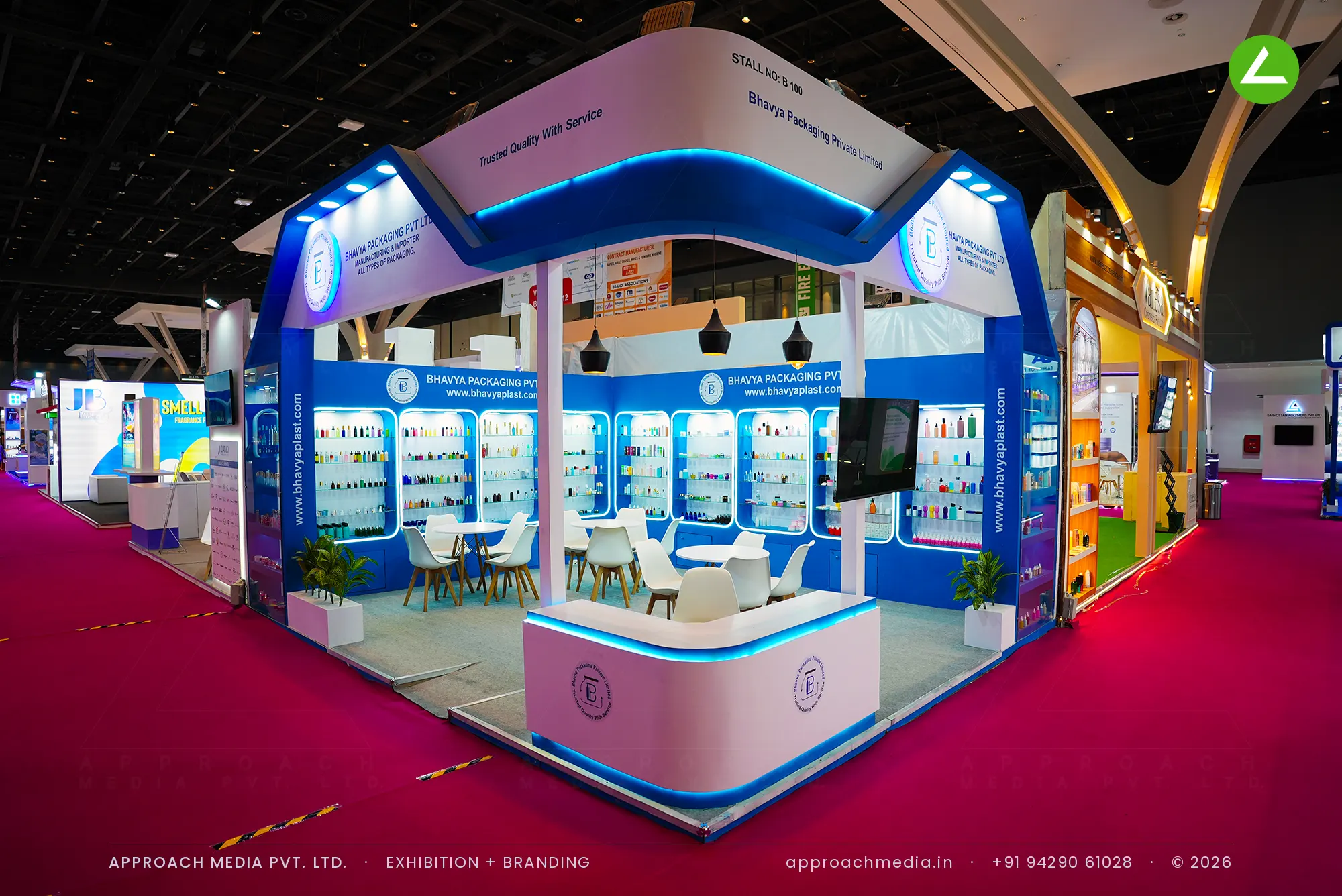 Bhavya Packaging exhibition stall design at CMPL Expo New Delhi with a curved white canopy over lit blue display niches