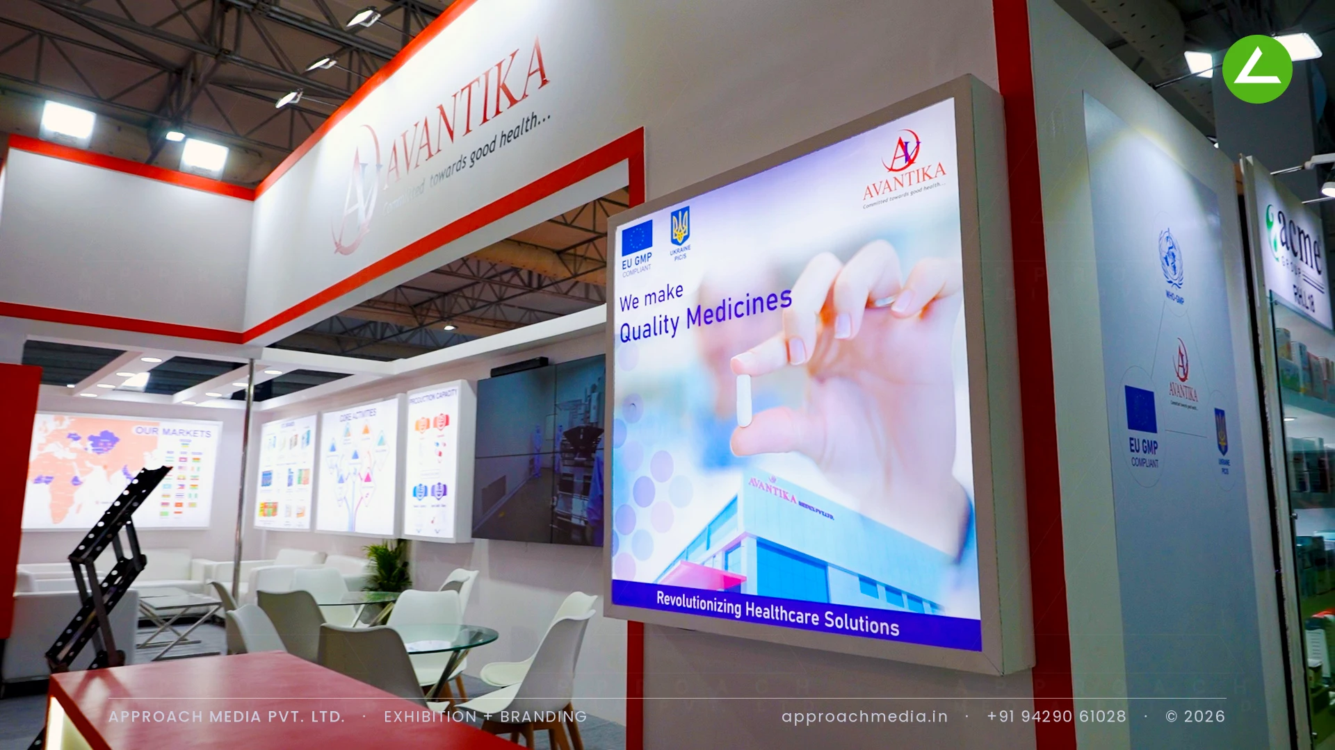 Avantika exhibition stall design at CPHI Greater Noida showing the red-banded fascia and a large backlit brand panel