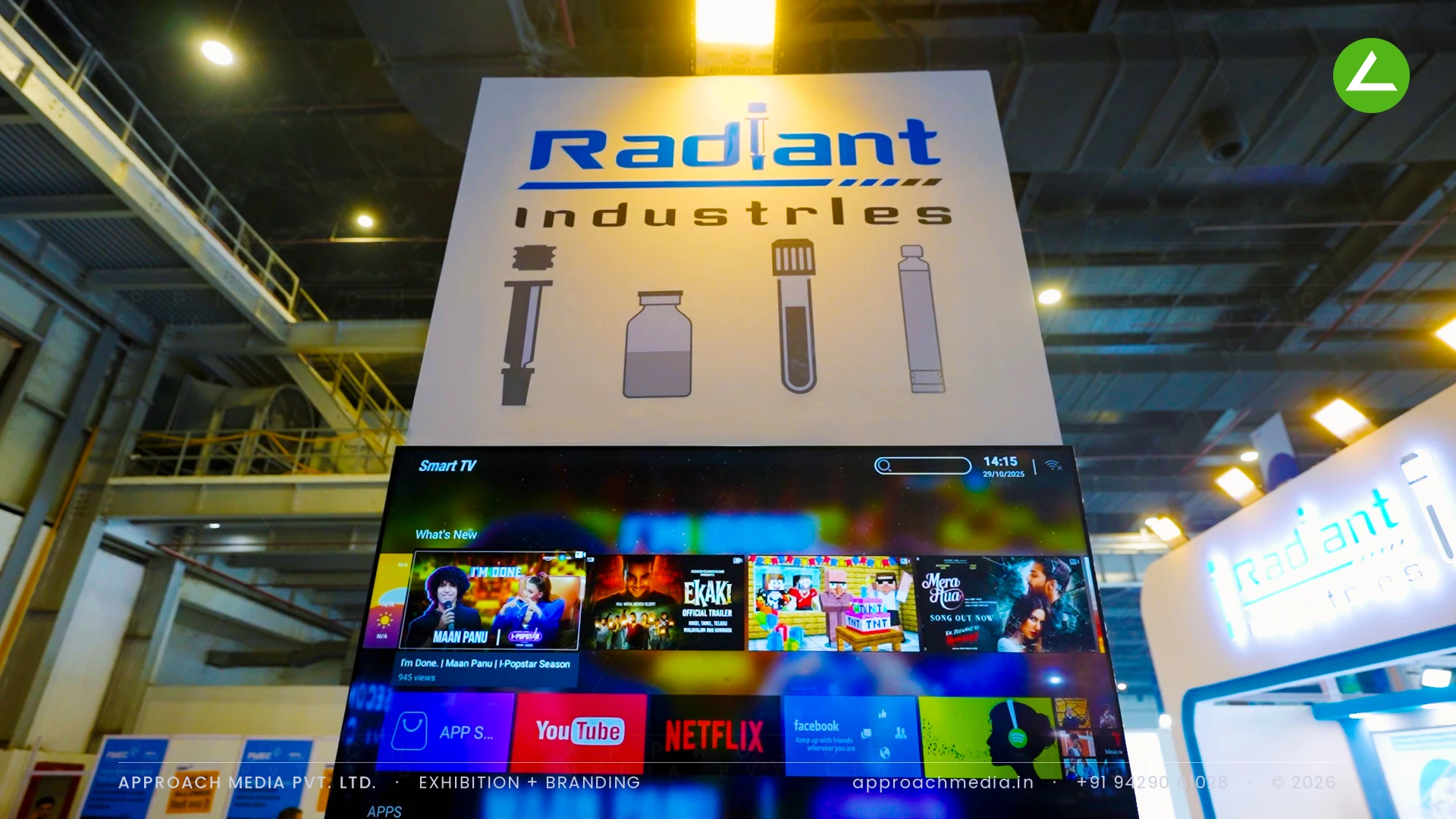 Radiant Industries exhibition stall design at CPHI Greater Noida, built around a live filling line — photo 3