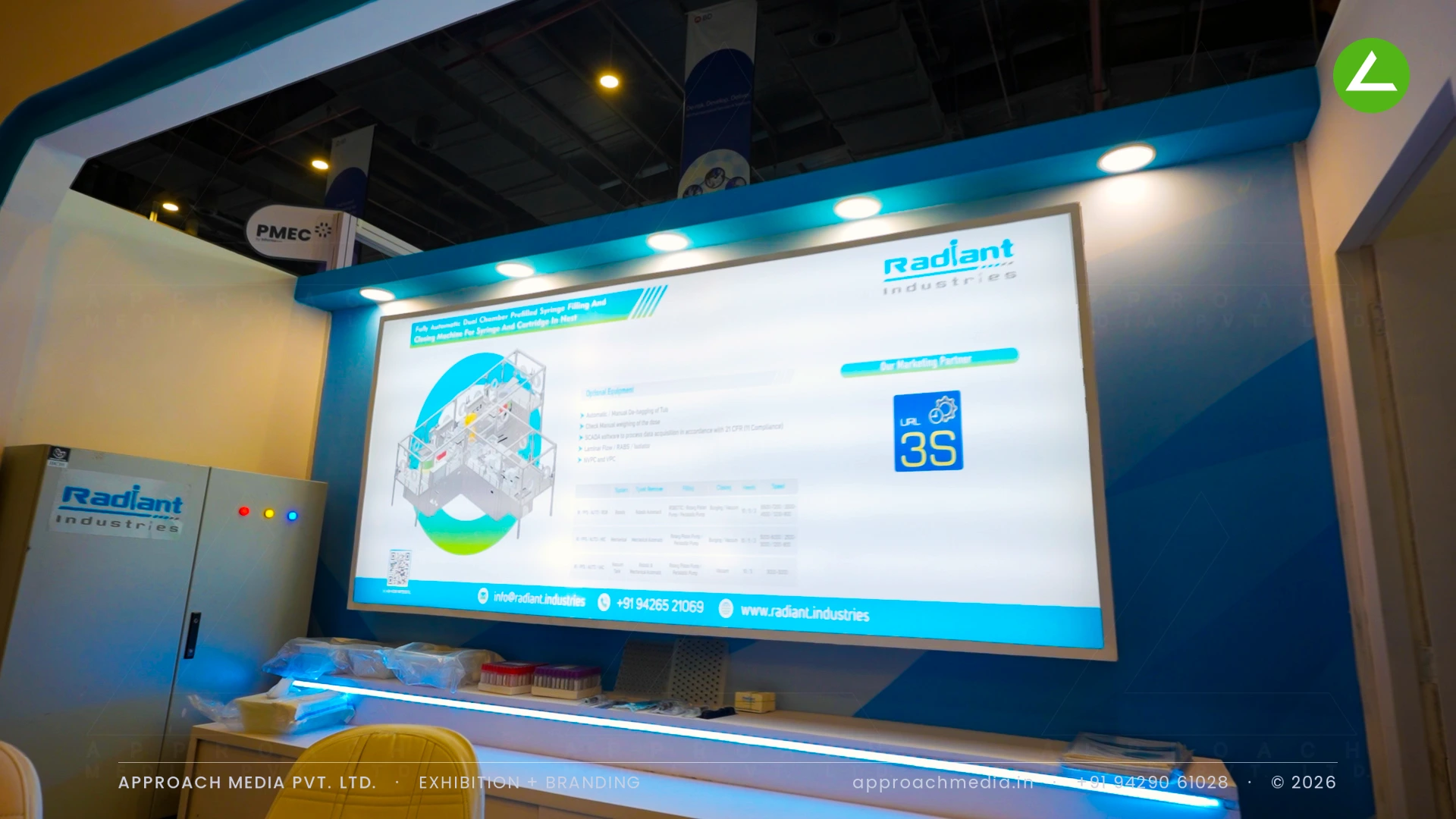 Radiant Industries exhibition stall design at CPHI Greater Noida, built around a live filling line — photo 4