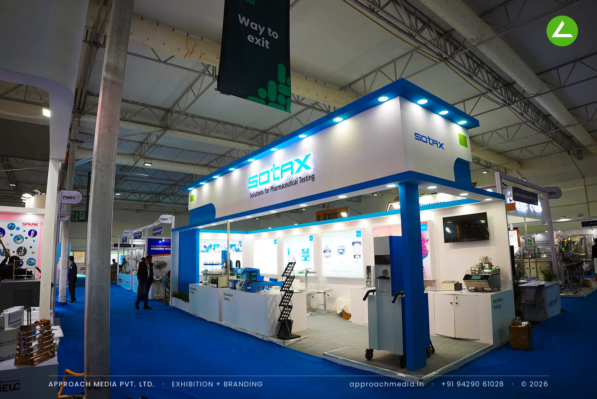 SOTAX exhibition stall design at CPHI Greater Noida, laid out like a lab bench — photo 2