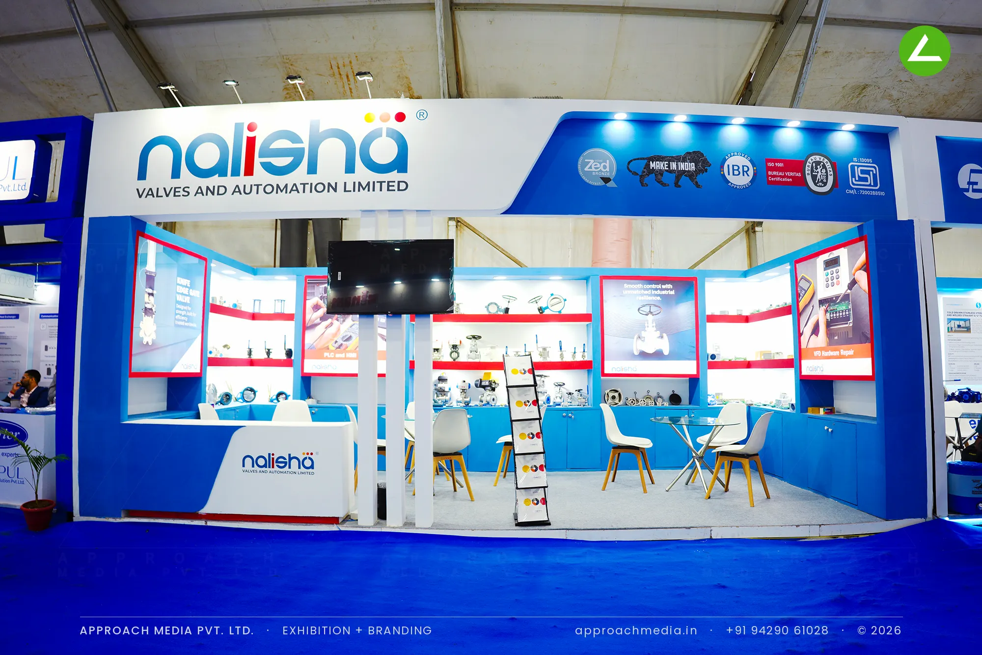 Nalisha Valves blue and white exhibition stall design at Dahej Industrial Expo Bharuch with lit valve display shelves