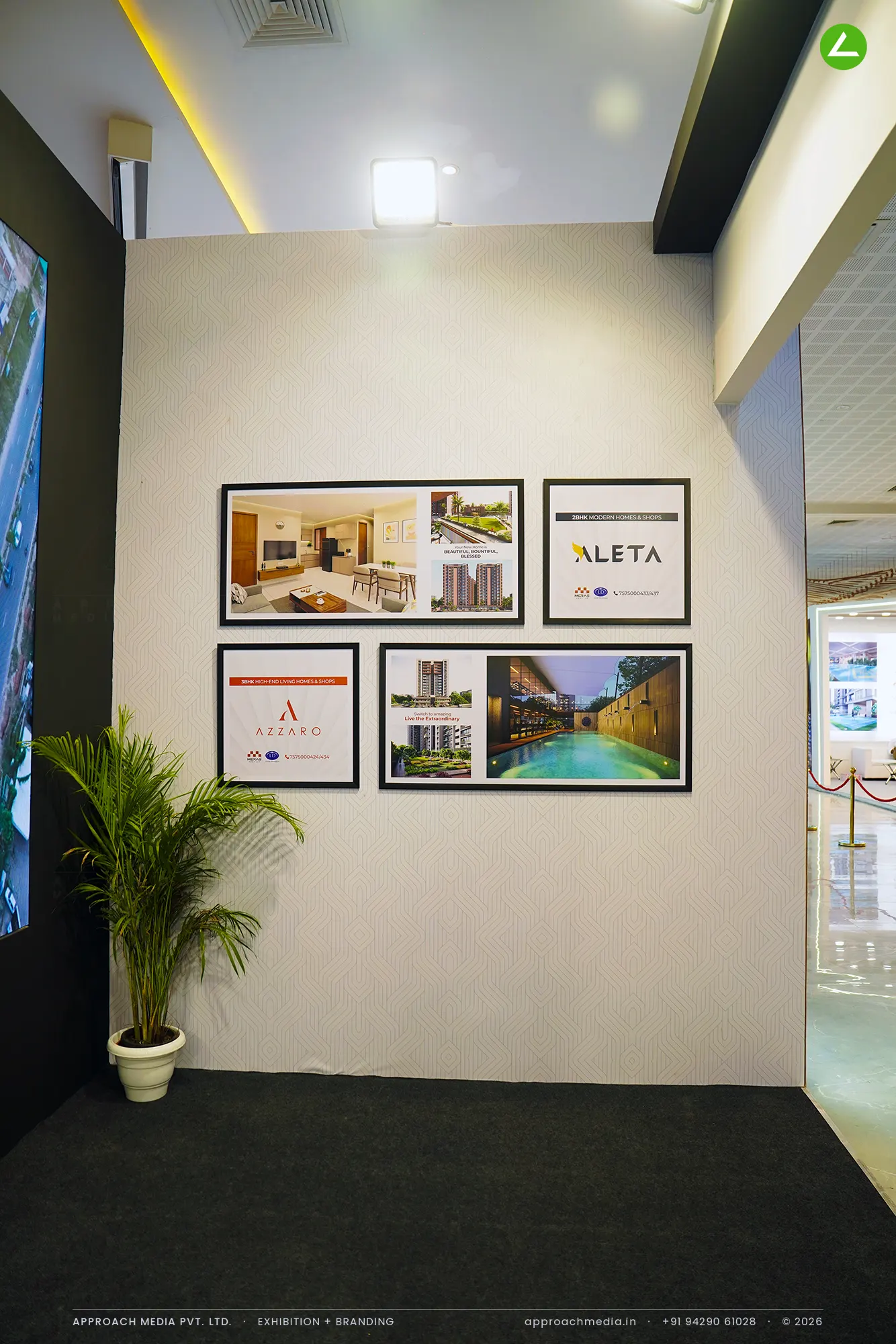 LD - Laxmi Developers: dark timber exhibition stall design at Divya Bhaskar Property Expo Ahmedabad — photo 2