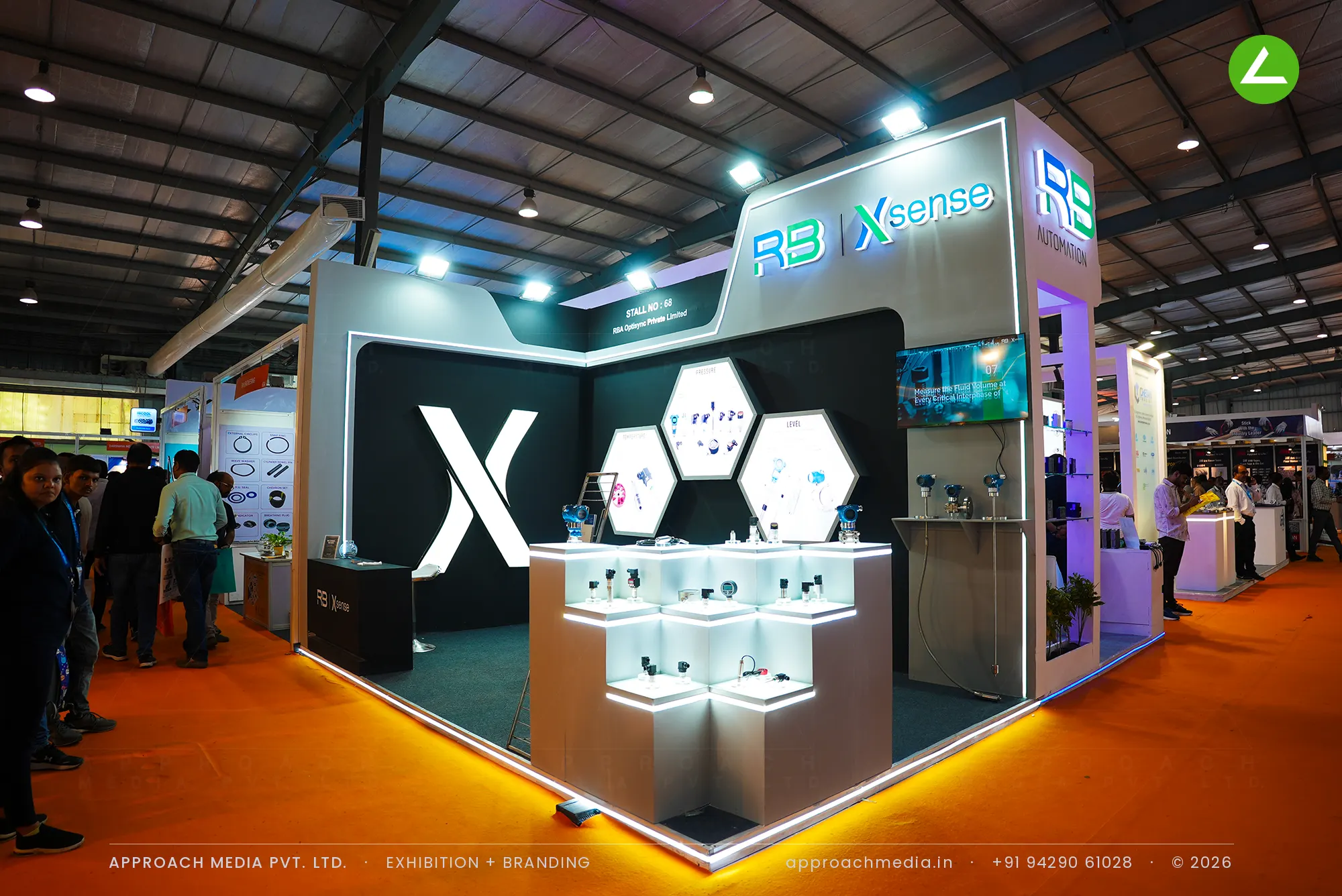 Black Xsense zone of the RB Automation exhibition stall design at EngiMach Gandhinagar with backlit hexagonal panels