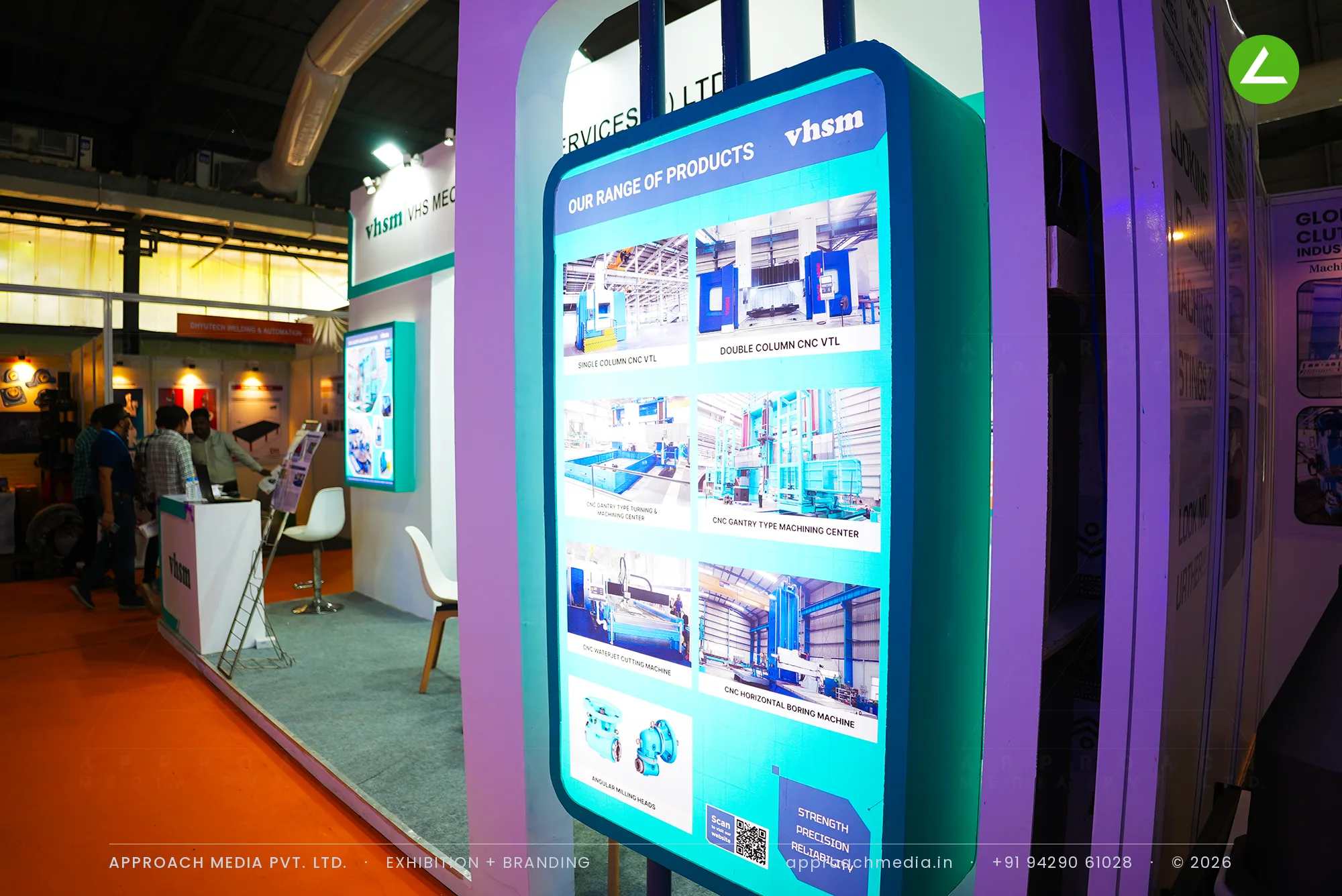 VHS Mechatronics (VHSM): teal-lit exhibition stall design at EngiMach Gandhinagar — photo 3