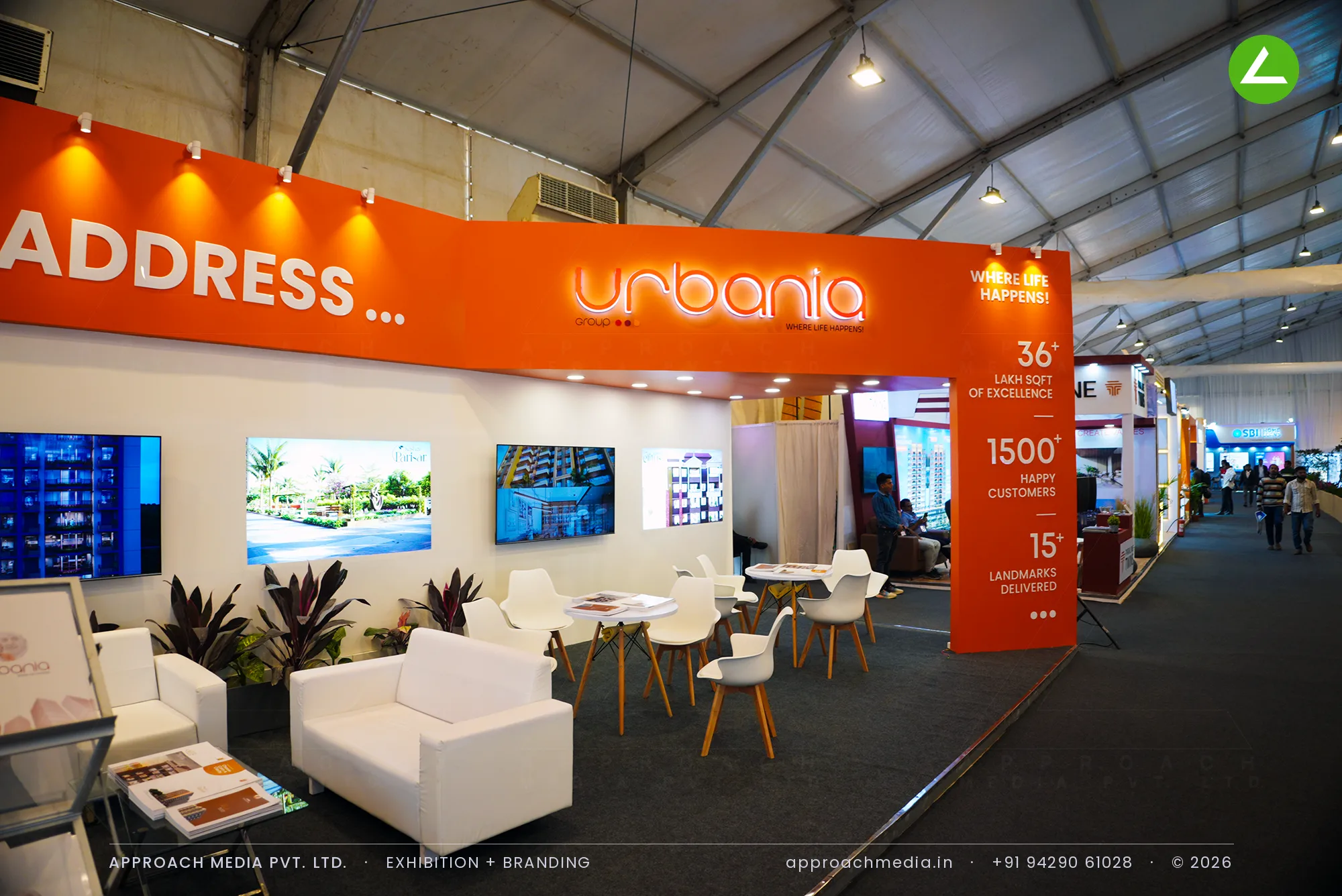 Urbania's orange-banded exhibition stall design at GIHED Tricity Property Expo, Gandhinagar — photo 4