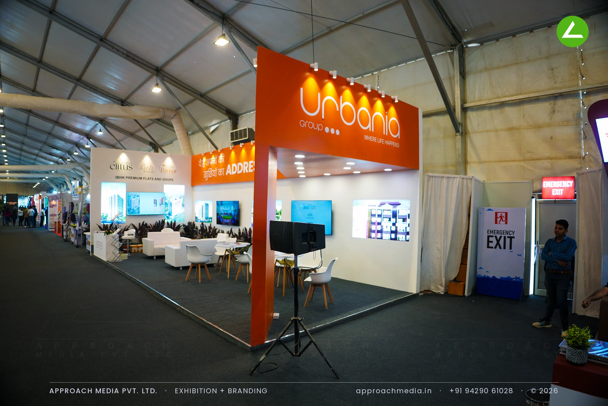 Urbania's orange-banded exhibition stall design at GIHED Tricity Property Expo, Gandhinagar — photo 2