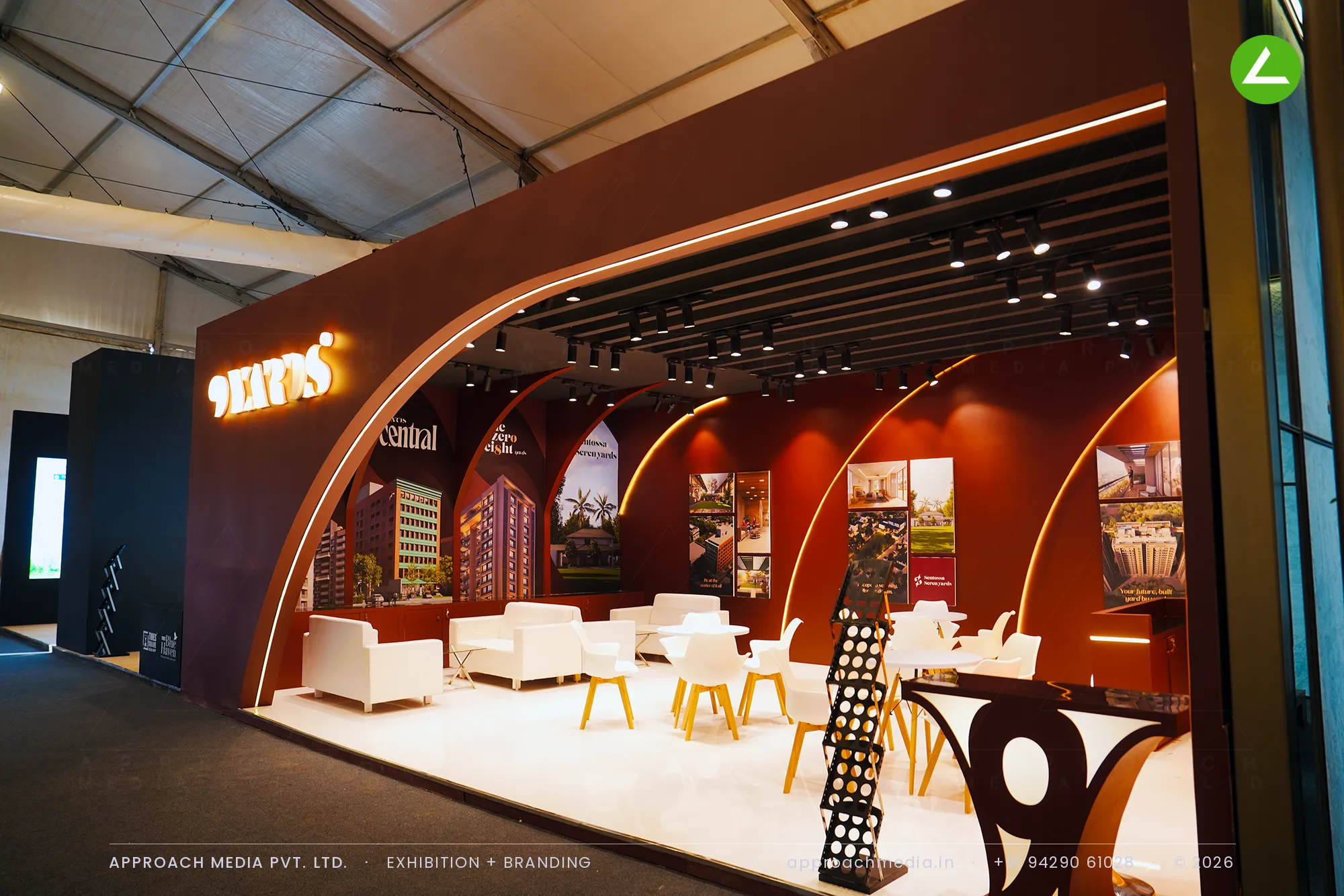 9 Yards: arched 54 sqm exhibition stall design at GIHED Property Show Ahmedabad 2025 — photo 2