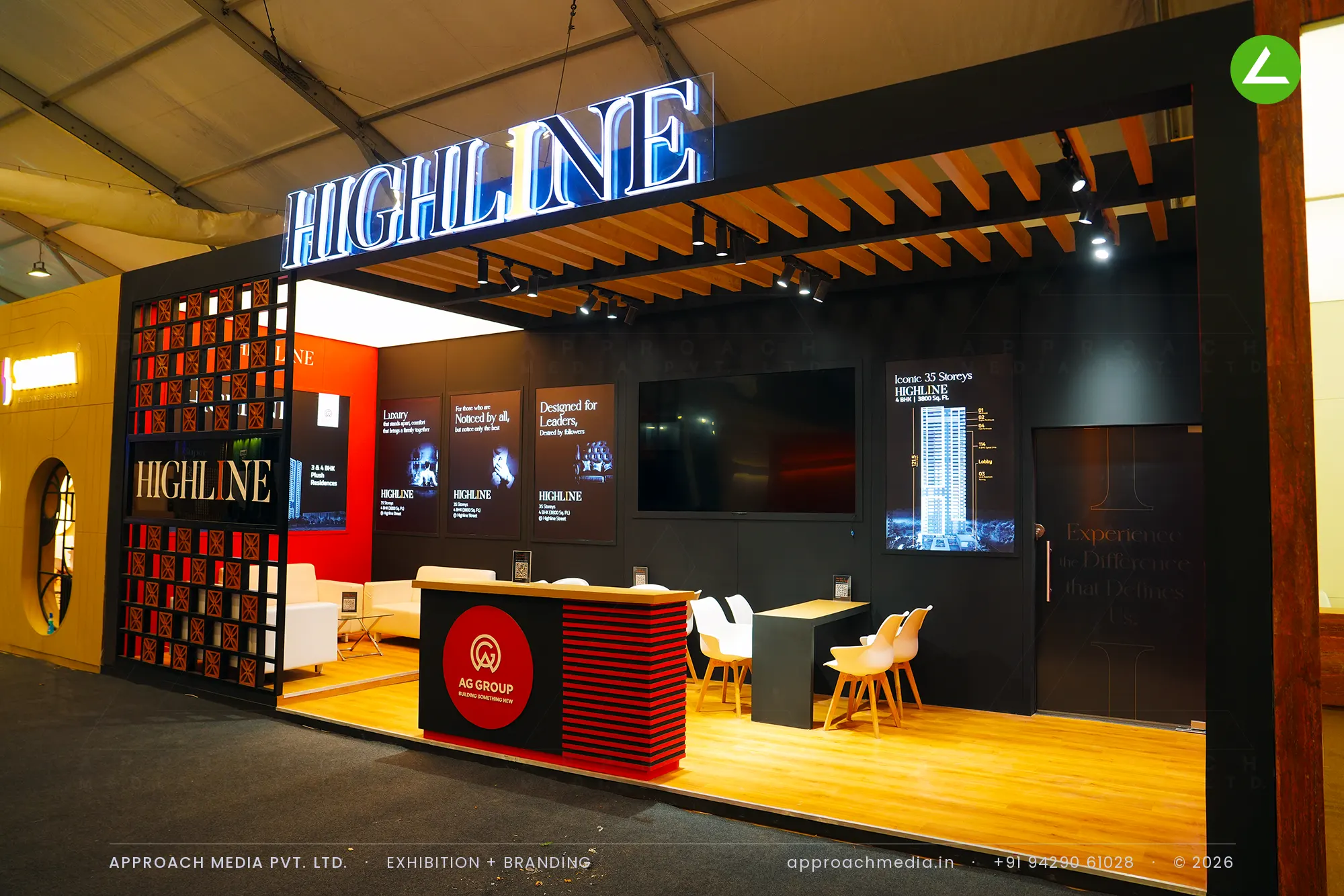 Highline by AG Group — exhibition stall design at GIHED Property Show Ahmedabad, with a walk-through gallery — photo 3