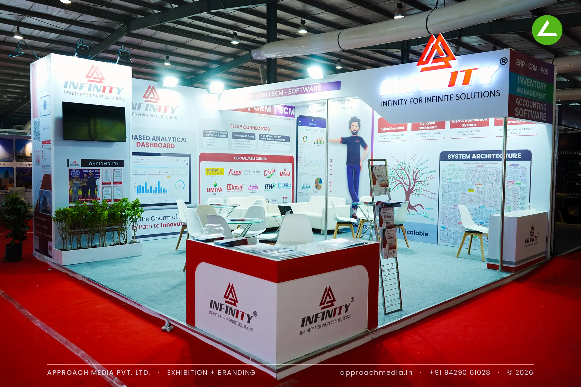 Infinity ERP exhibition stall design at GPBS Gandhinagar, with printed software graphic walls and a red arrival counter