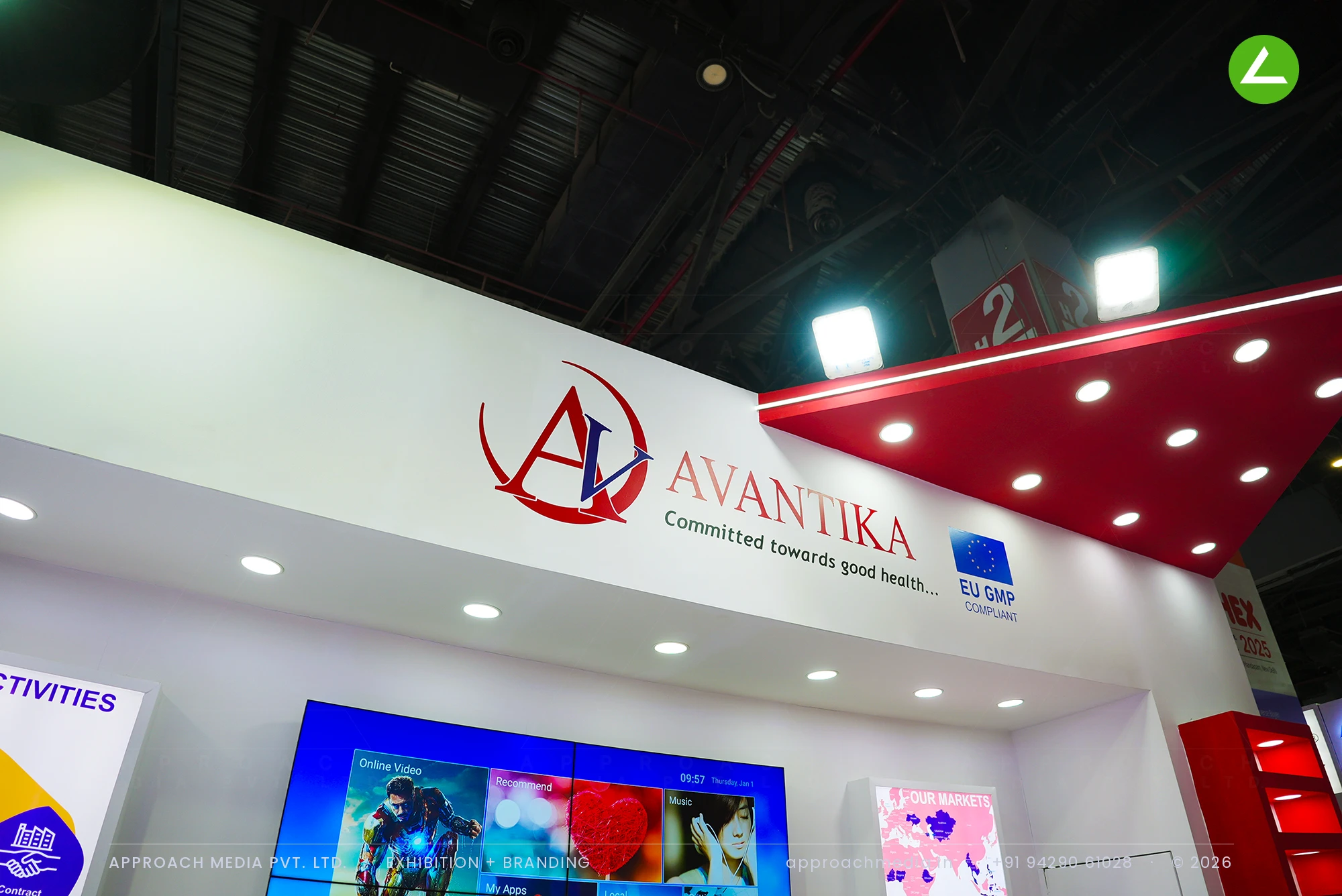 Avantika at iPHEX New Delhi — Red-and-White Exhibition Stall Design with an Angled Canopy — photo 3