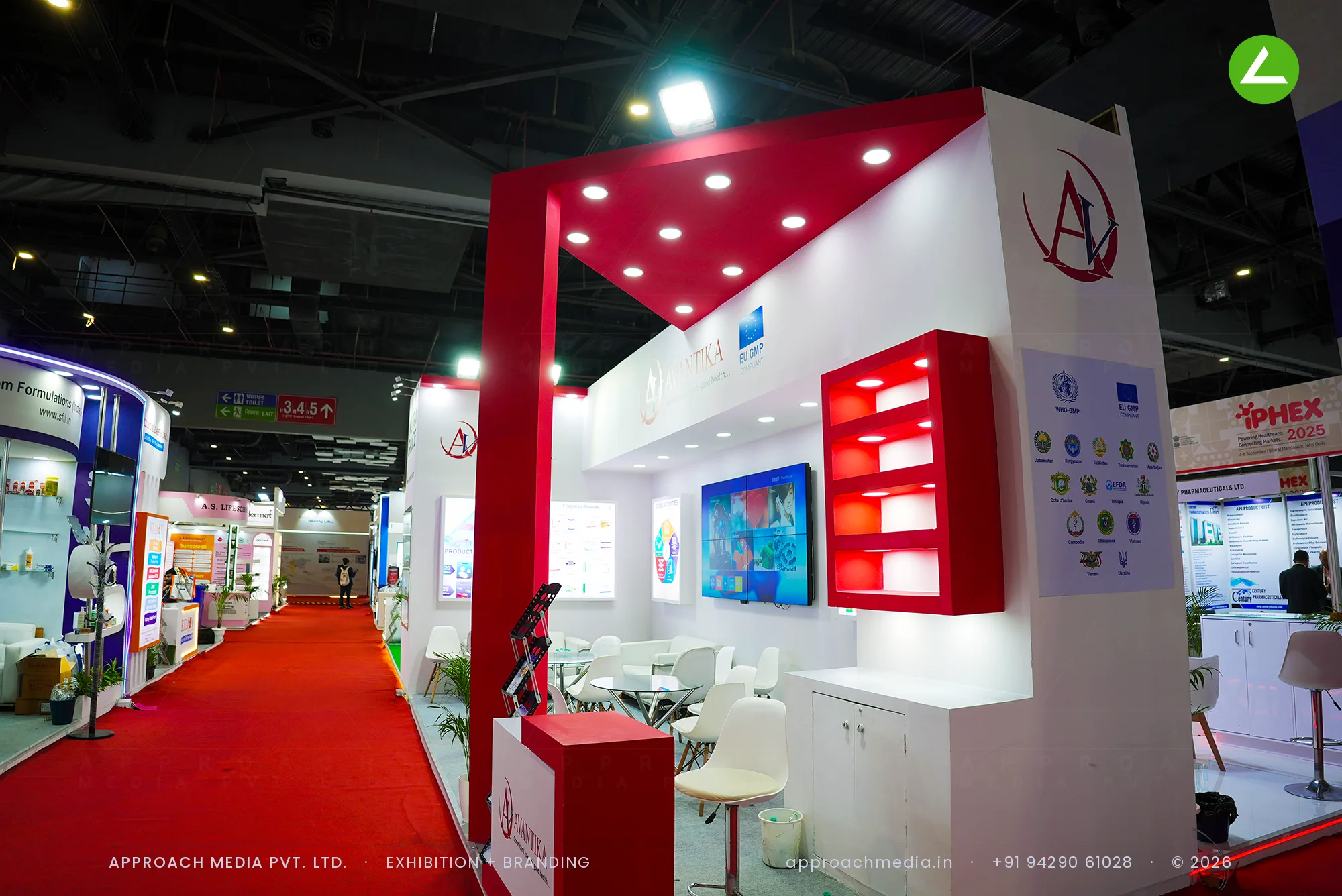 Avantika at iPHEX New Delhi — Red-and-White Exhibition Stall Design with an Angled Canopy — photo 2