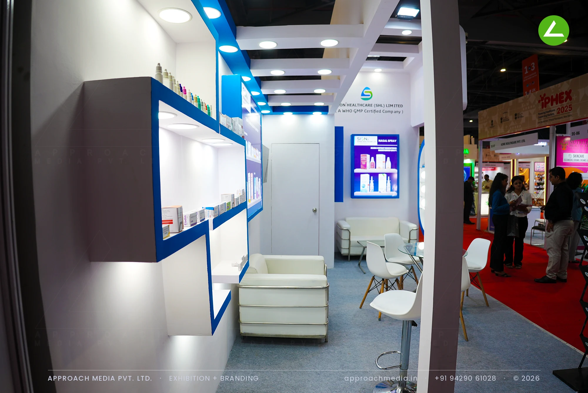 Sion Healthcare (SHL) Limited: Exhibition Stall Design at iPHEX New Delhi with a Blue Oval Frame — photo 3
