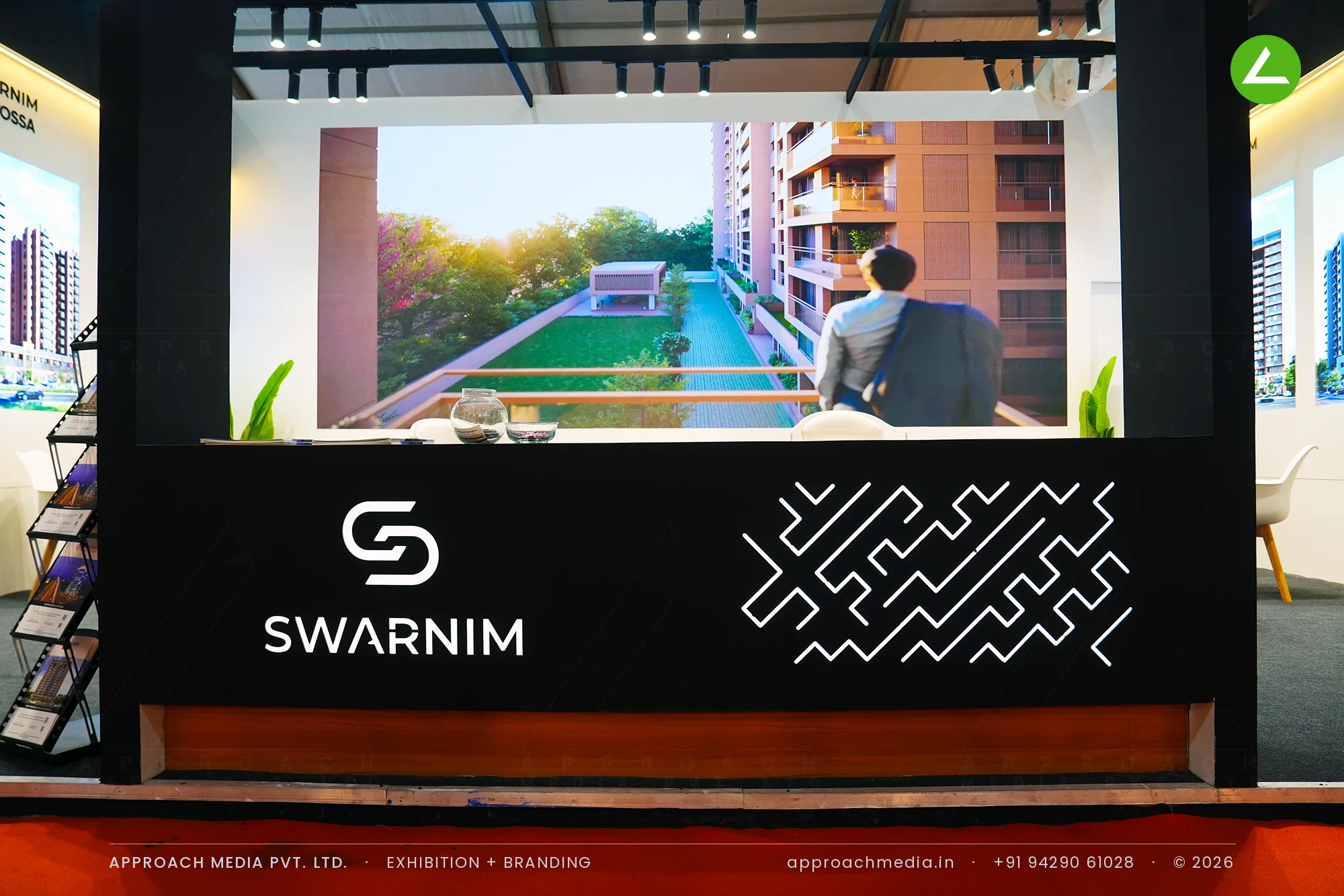 Swarnim — video-wall exhibition stall design at NAREDCO Property Expo Ahmedabad 2025 — photo 4