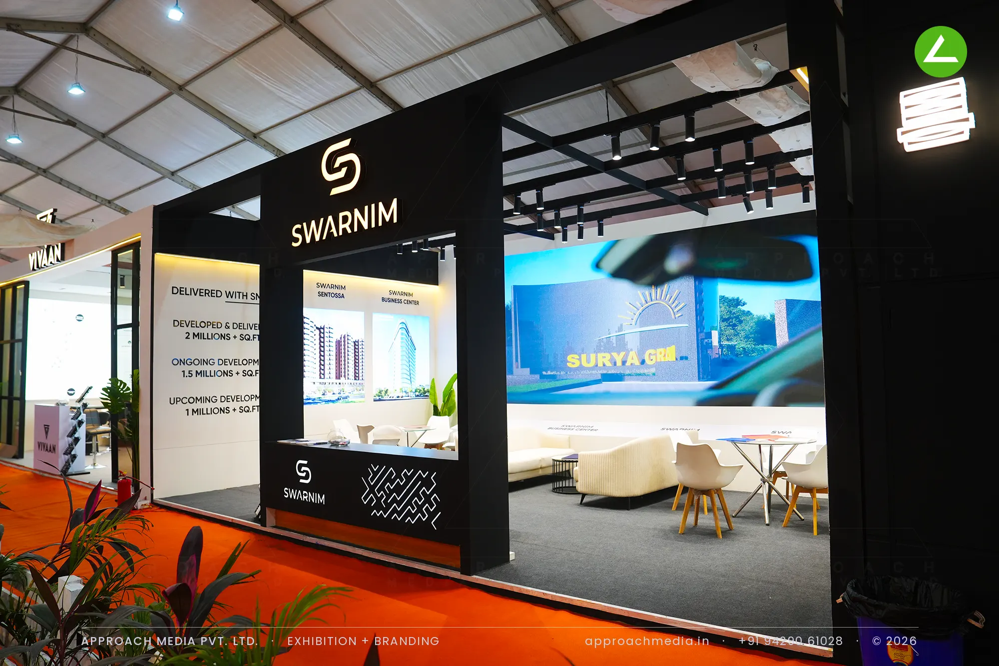 Swarnim — video-wall exhibition stall design at NAREDCO Property Expo Ahmedabad 2025 — photo 3