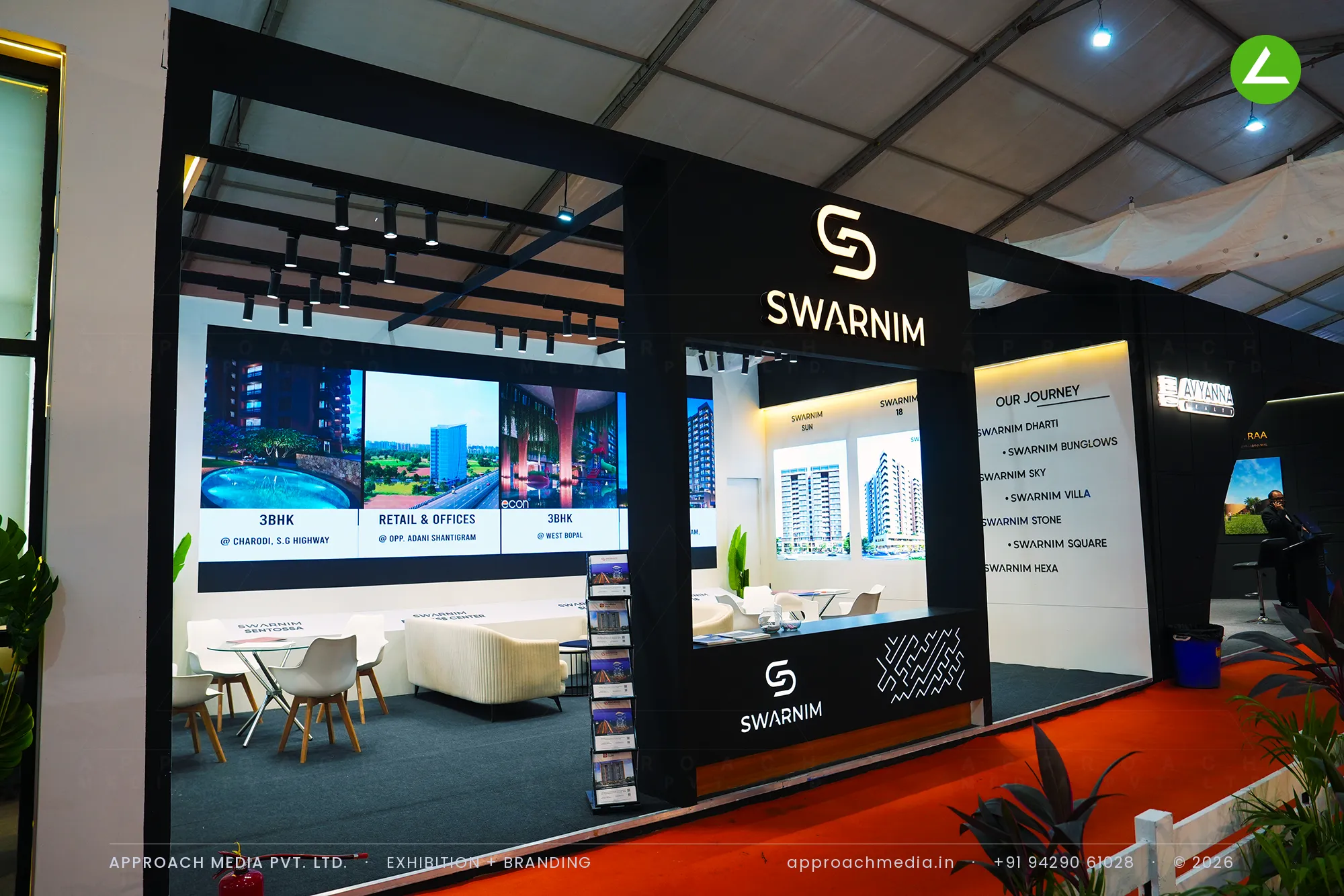 Swarnim — video-wall exhibition stall design at NAREDCO Property Expo Ahmedabad 2025 — photo 2