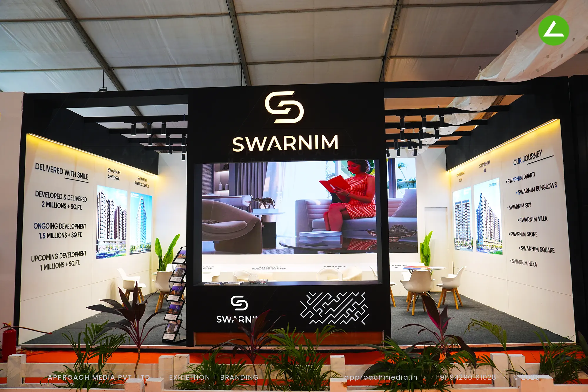 Swarnim exhibition stall design at NAREDCO Property Expo Ahmedabad centred on a large LED video wall