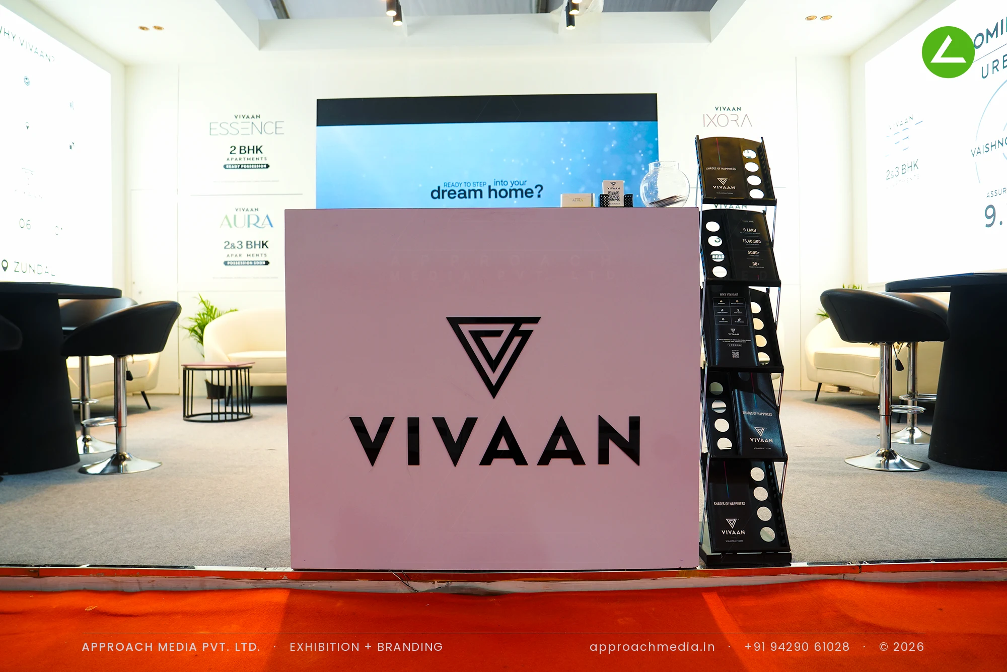 Vivaan at NAREDCO Property Expo Ahmedabad — a 48 sqm exhibition stall design in mocha and ivory — photo 4