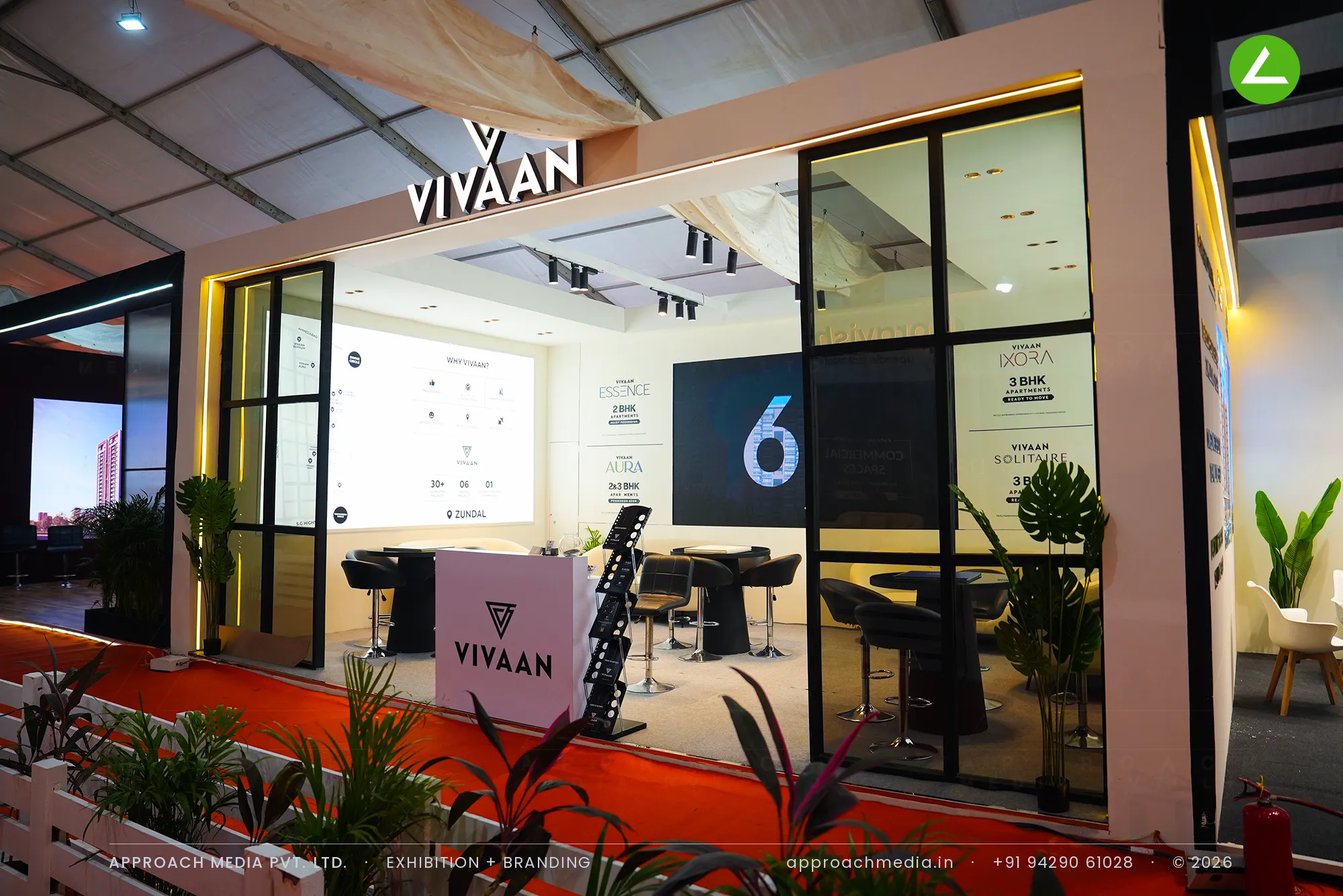 Vivaan at NAREDCO Property Expo Ahmedabad — a 48 sqm exhibition stall design in mocha and ivory — photo 3