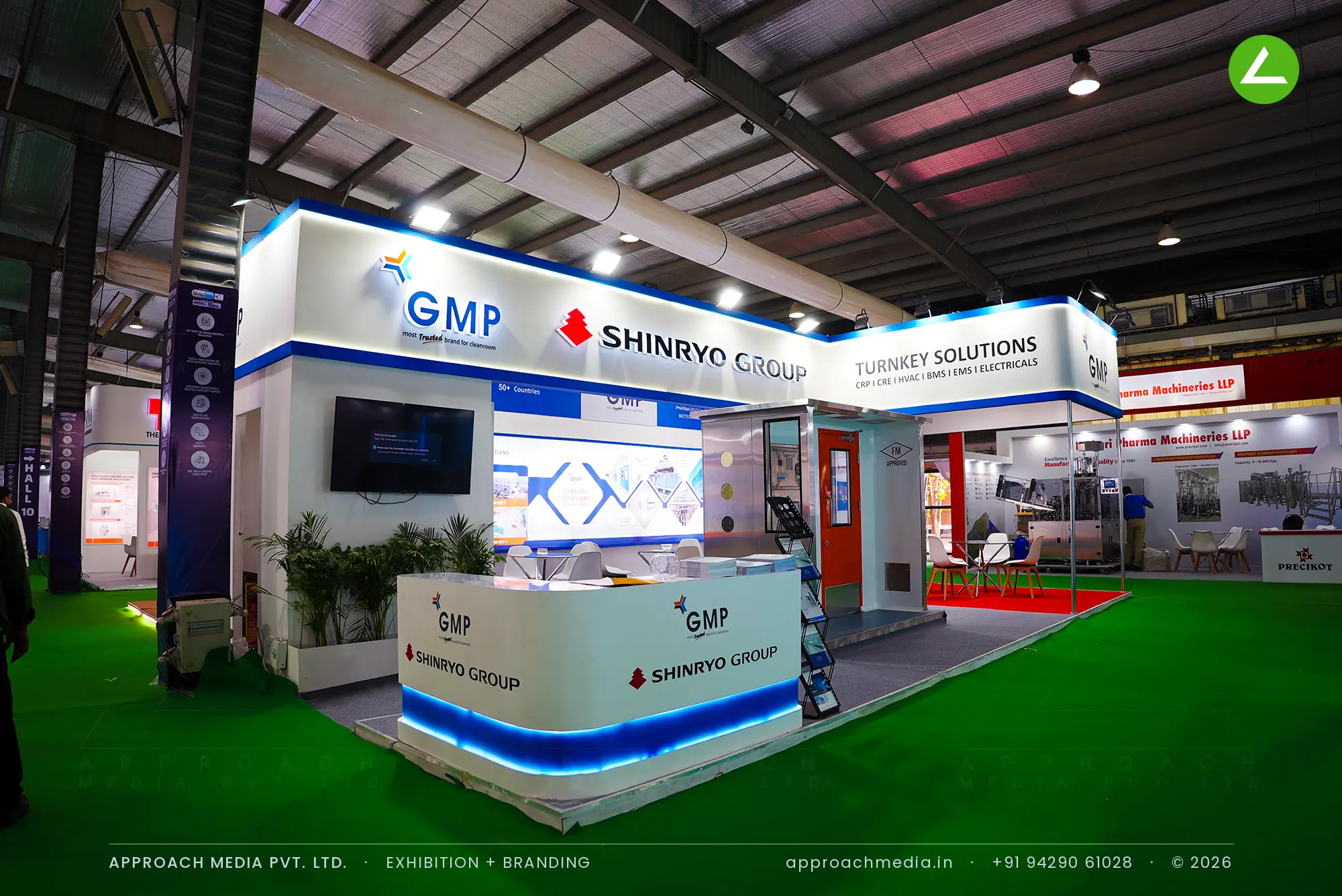 GMP and Shinryo Group exhibition stall design at Pharmatech Expo Gandhinagar with a walk-in cleanroom mock-up