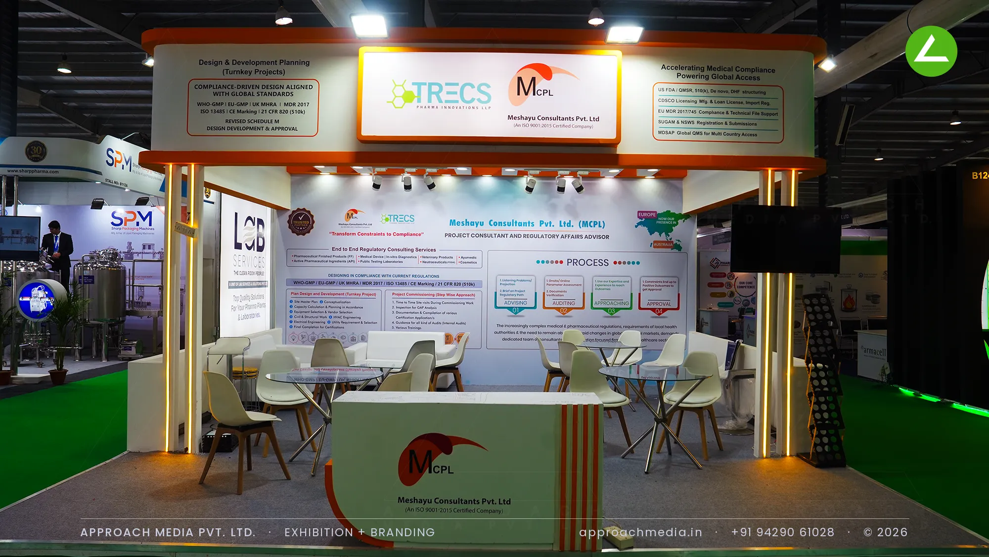 TRECS and MCPL stall with lifted lightbox canopy and meeting tables, exhibition stall design at Pharmatech Expo Gandhinagar