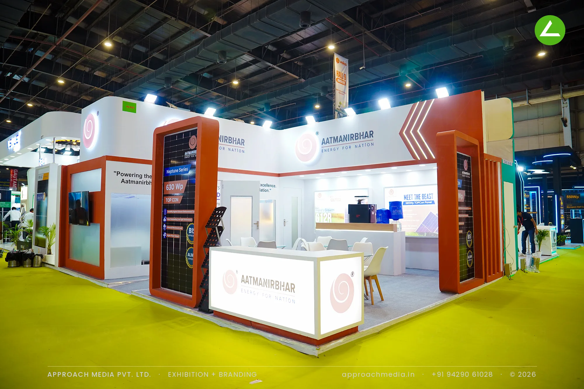 Aatmanirbhar exhibition stall design at REI Expo Greater Noida with rust module portals and a backlit reception counter