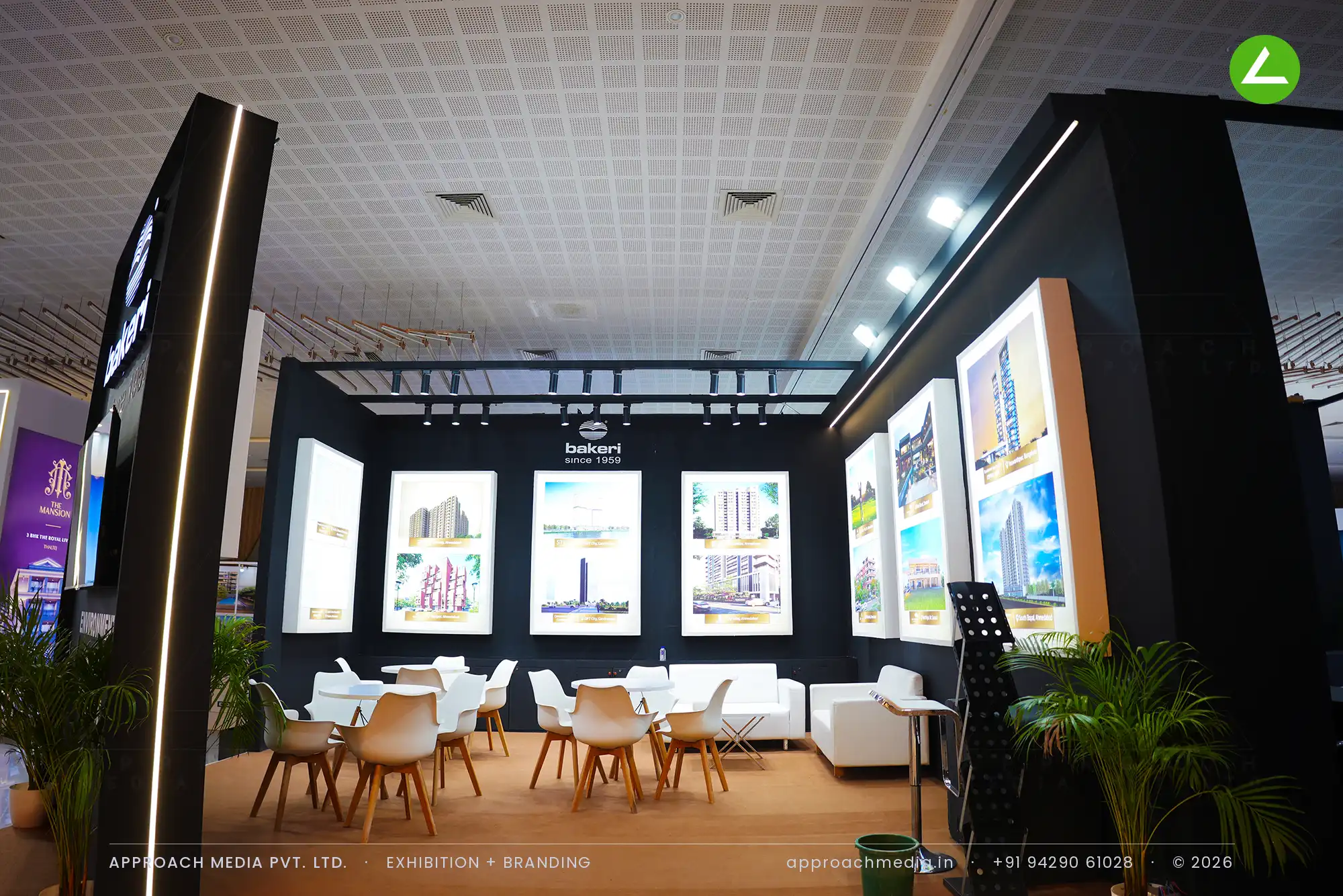 Bakeri's matte black 36 sqm exhibition stall design at Times Property Expo Ahmedabad — photo 2