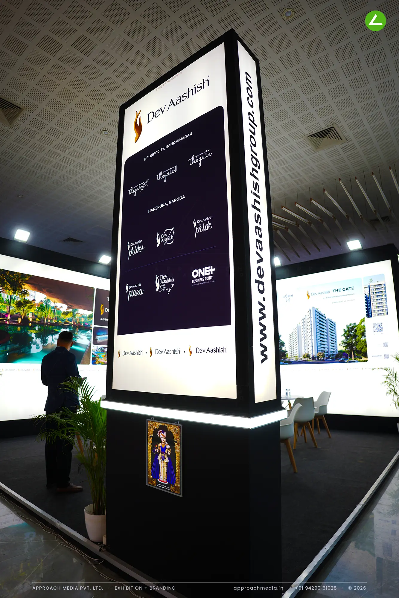 Dev Aashish Group's backlit 36 sqm exhibition stall design at Times Property Expo Ahmedabad — photo 4