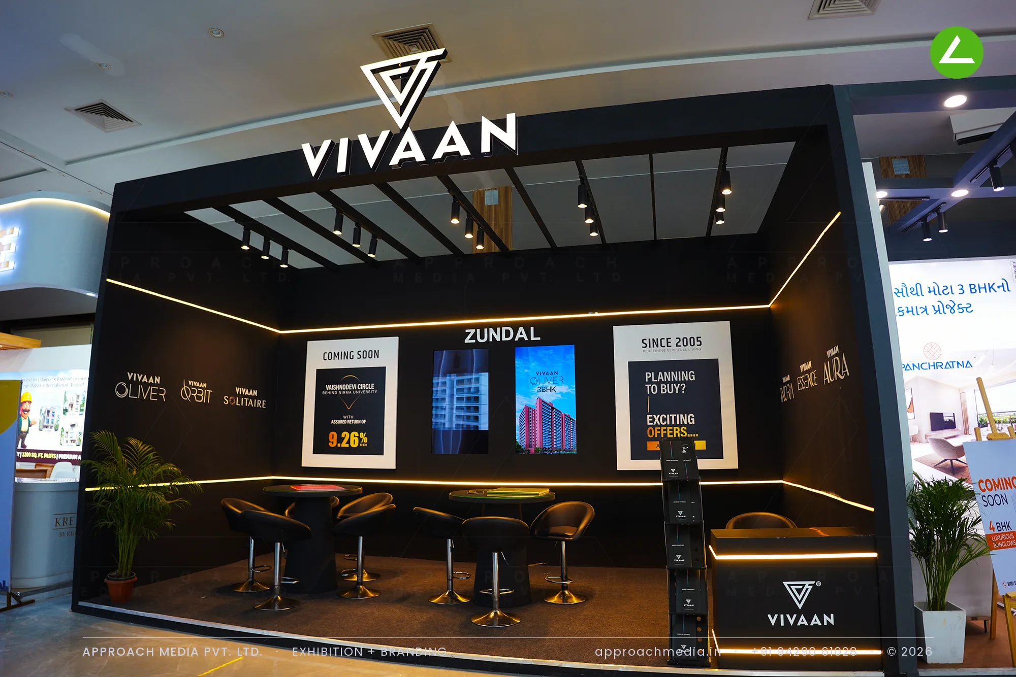 Vivaan at Times Property Expo Ahmedabad 2025 — Black-and-Gold Exhibition Stall Design — photo 2