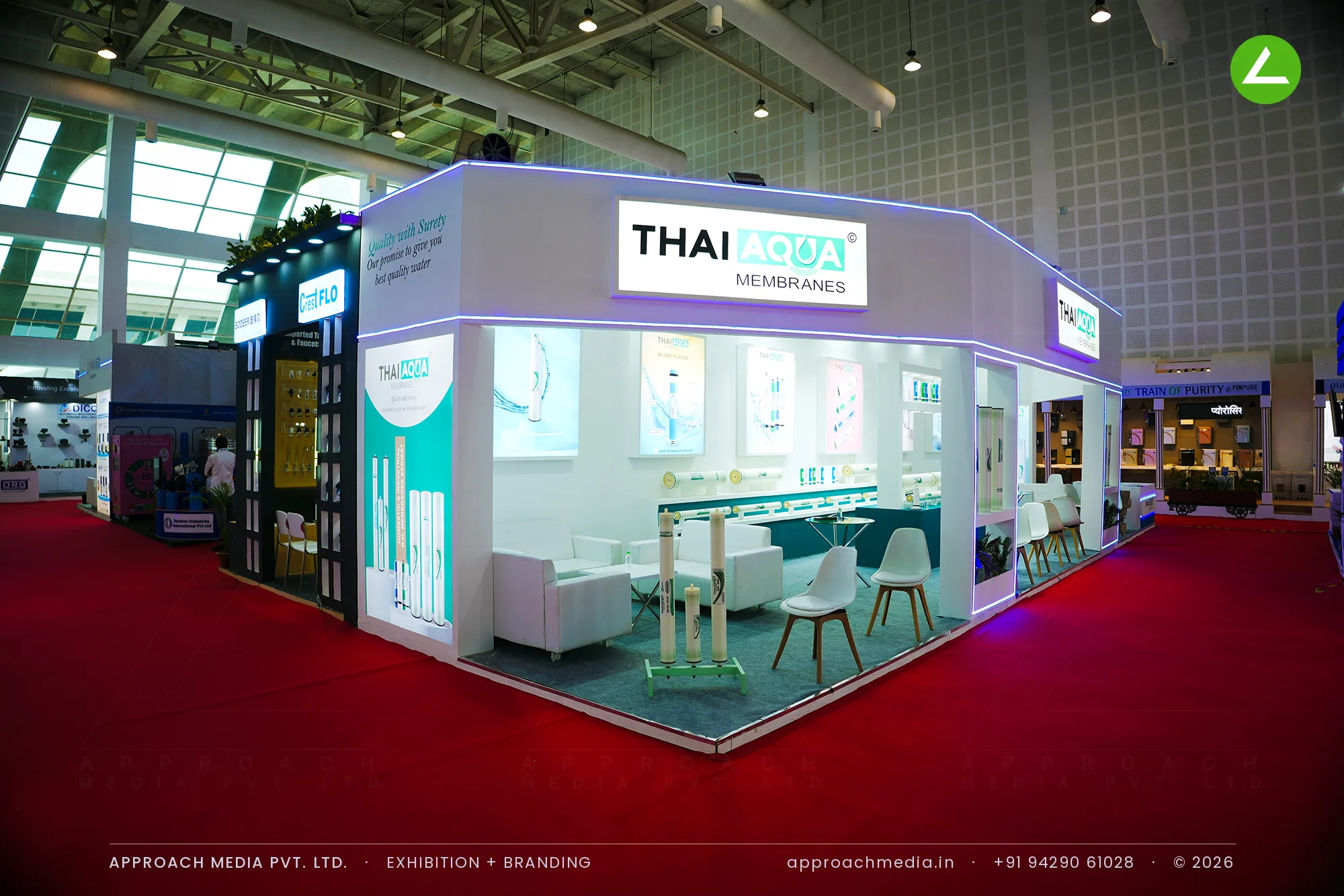Thai Aqua exhibition stall design at WAPTAG Water Expo Gandhinagar, chamfered white corners and a backlit fascia