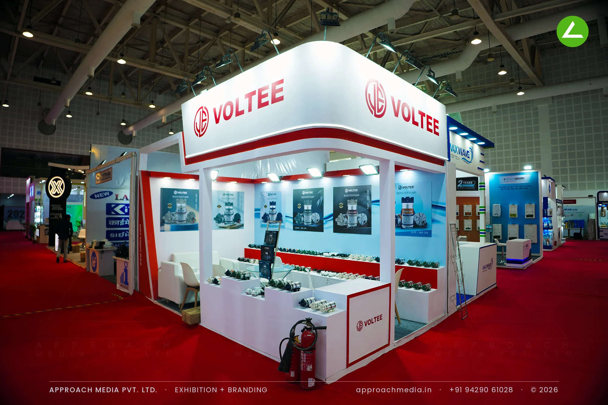 Voltee exhibition stall design at WAPTAG Water Expo Gandhinagar with booster pumps on stepped white counters
