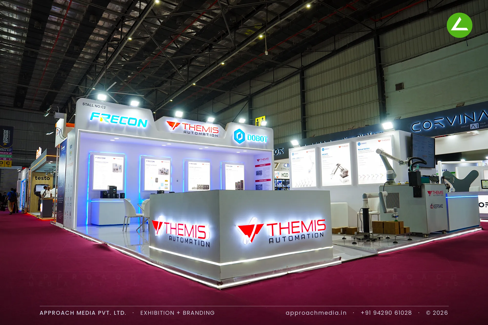 Themis Automation island with three lit brand crowns — exhibition stall design at Automation Expo Mumbai